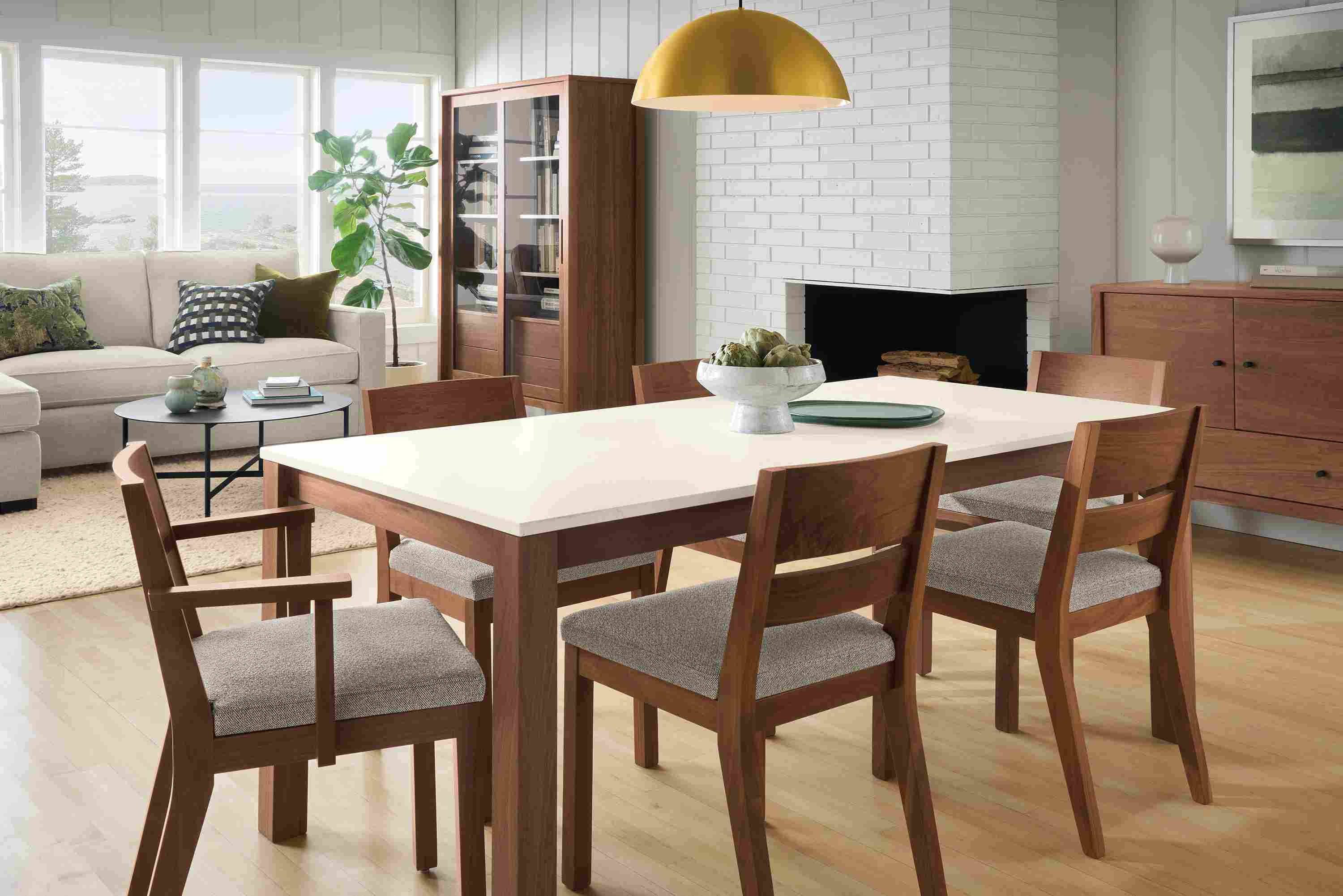 Great room with Linden dining table in walnut and 6 Afton chairs  in Tatum Bone and walnut.