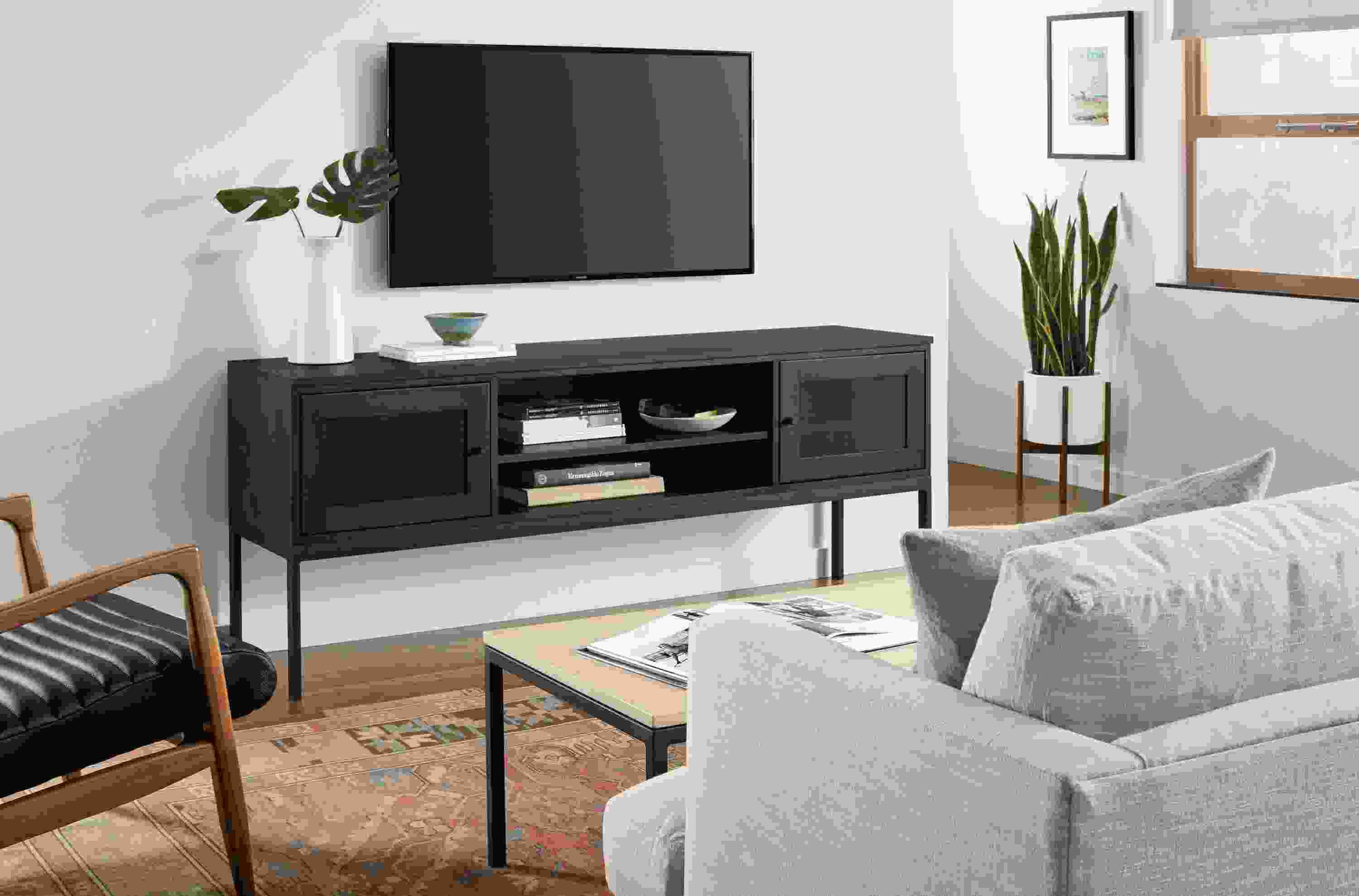 Detail of Linear two-door media cabinet.