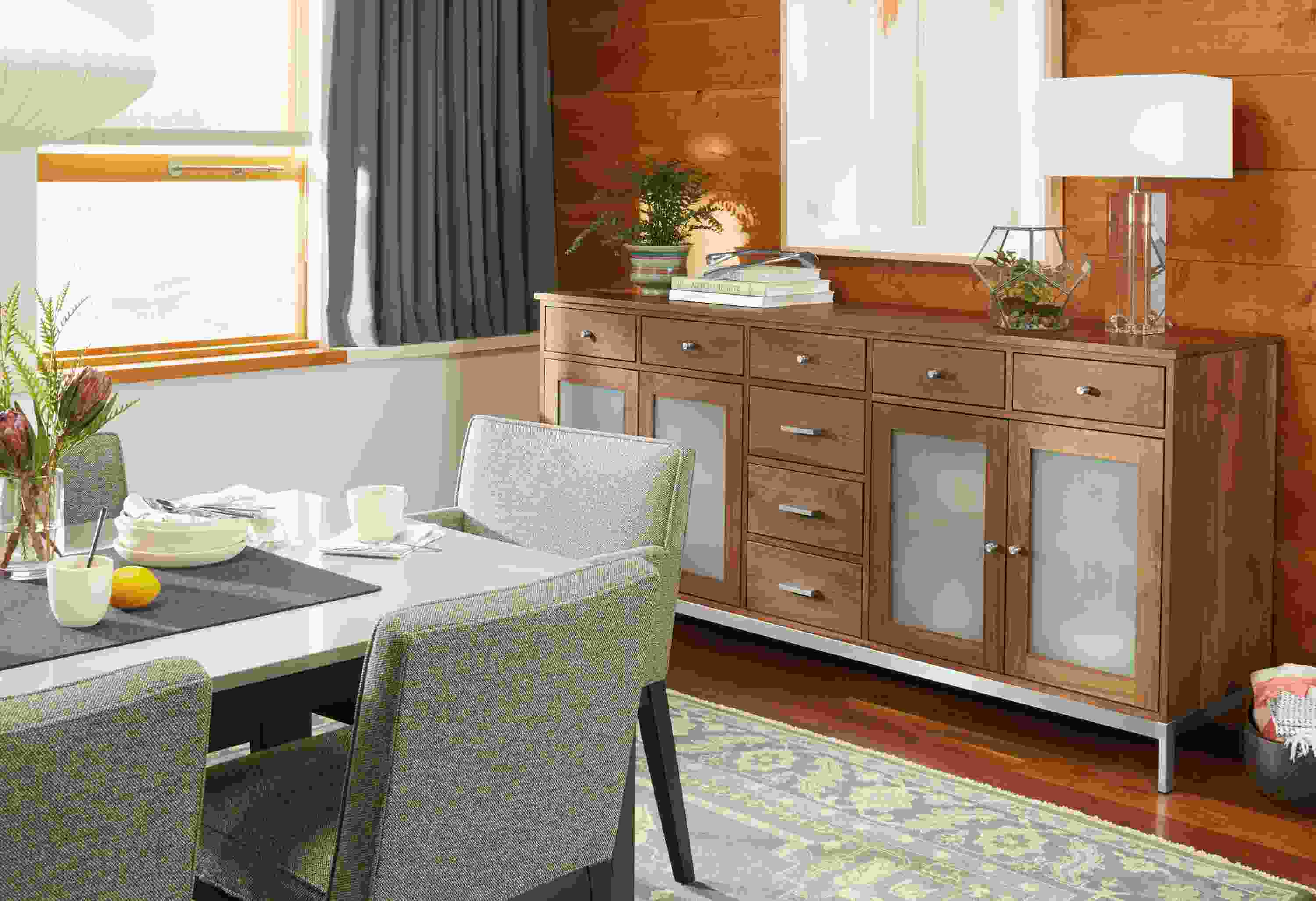 Dining room with Linear custom cabinet in walnut.