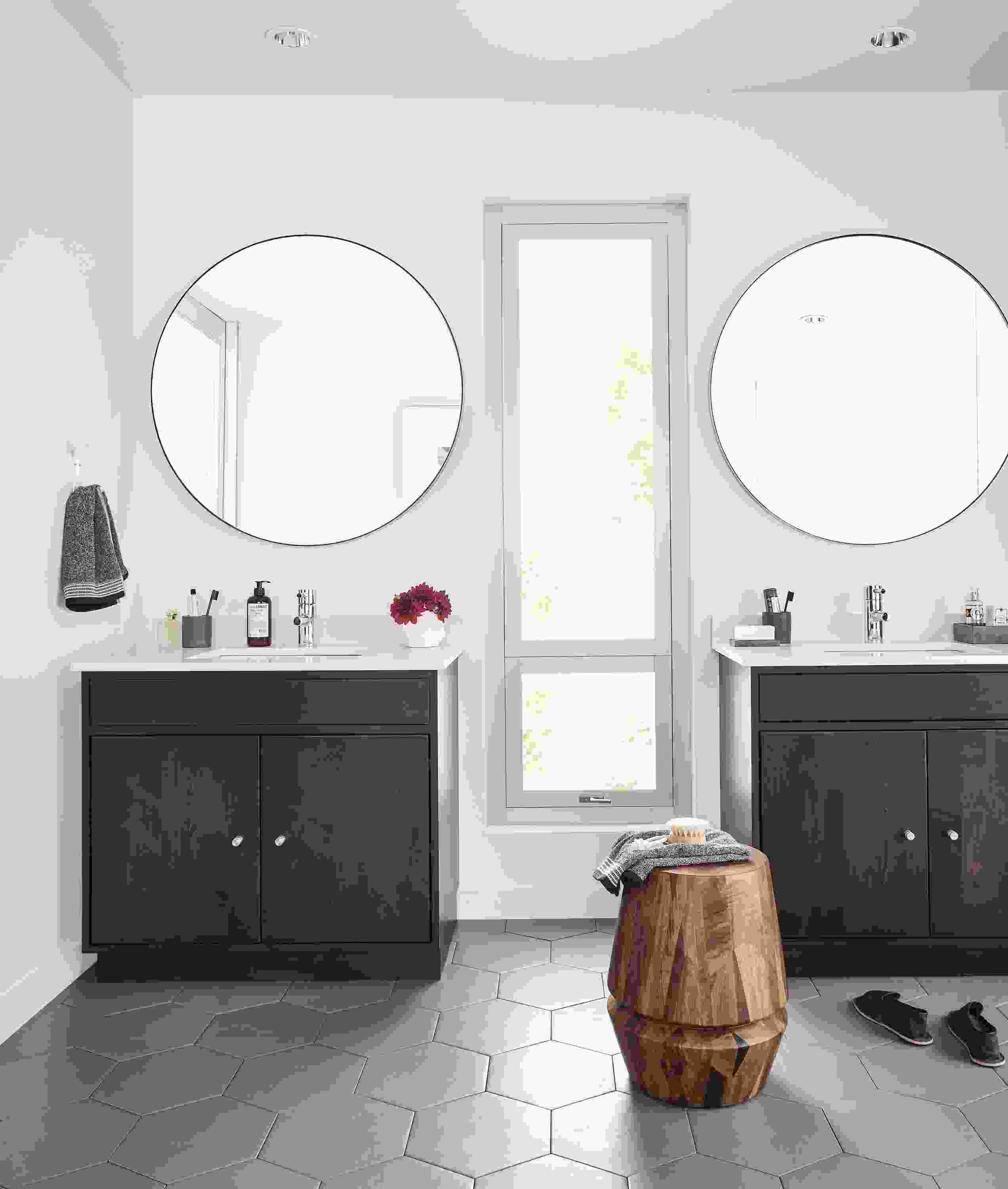 Detail of two Linear vanities in bathroom.