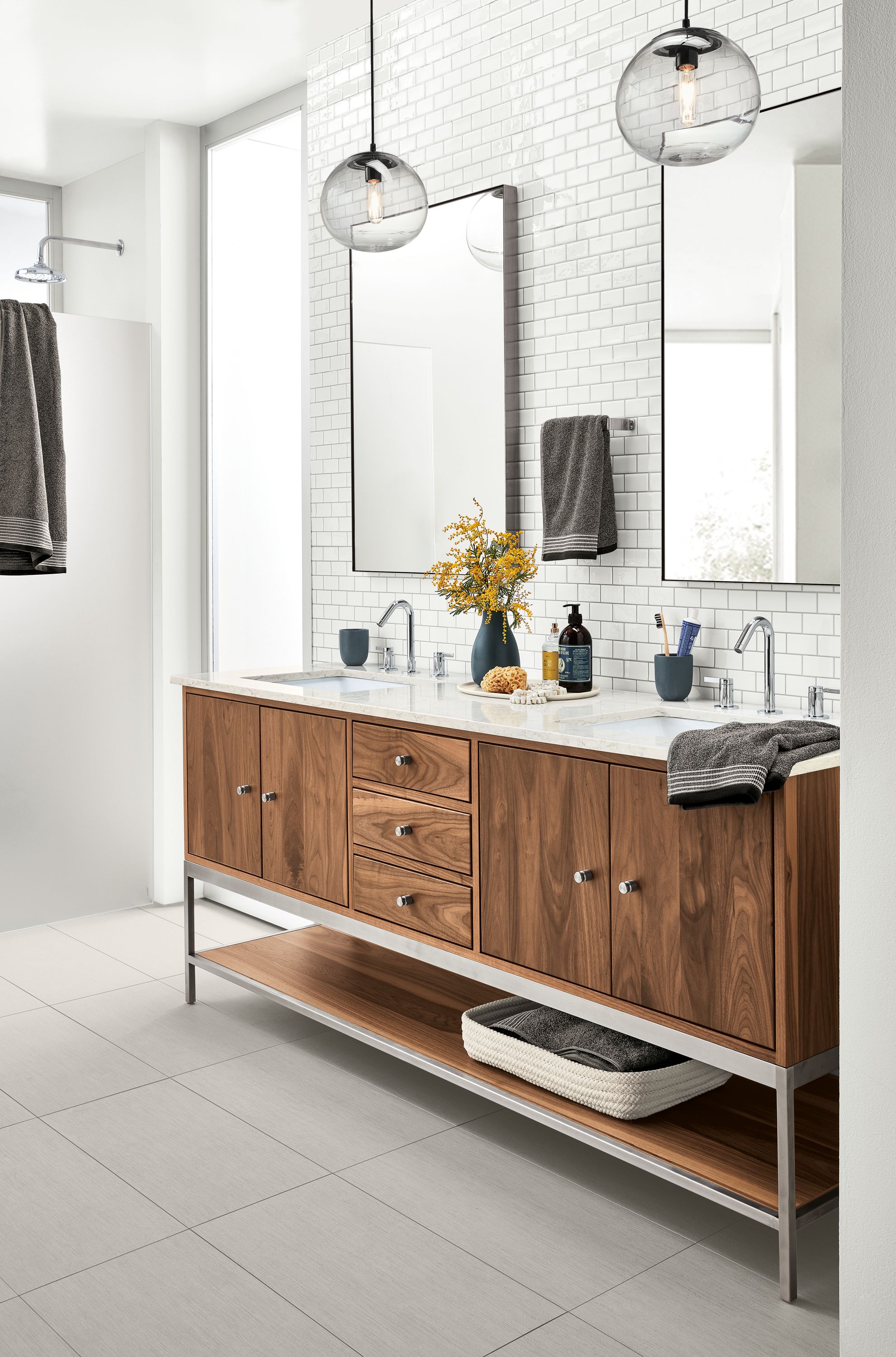 Detail of double sink walnut Linear vanity.
