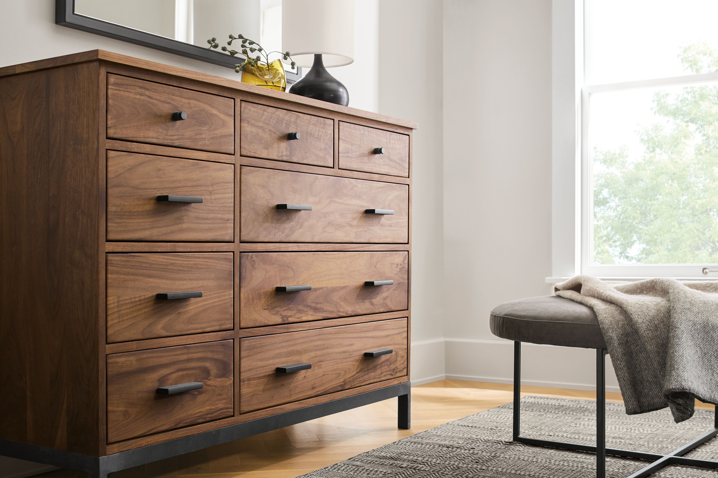 Detail of Linear walnut nine-drawer dresser.