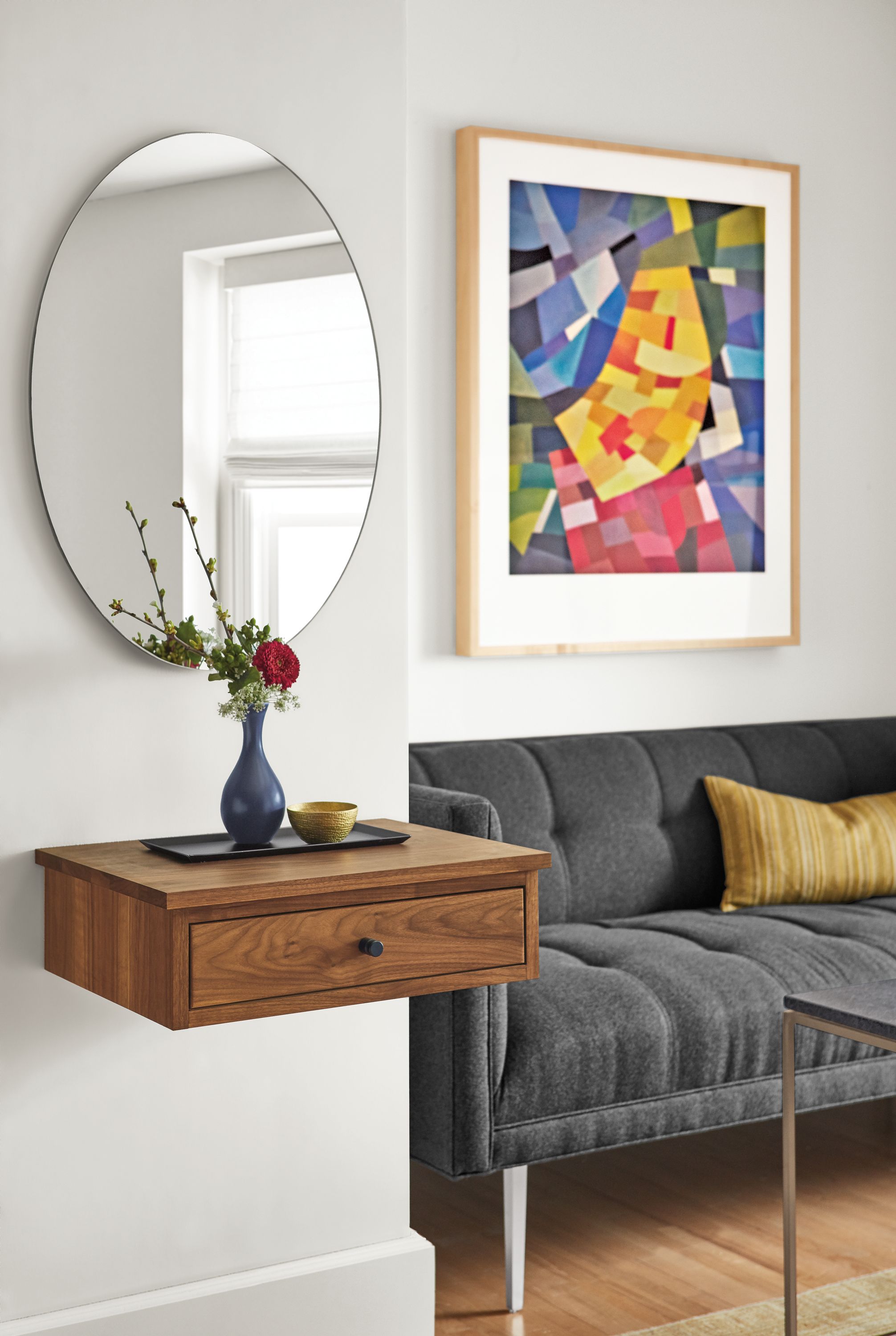 Detail of Linear wall-mounted nightstand in walnut.