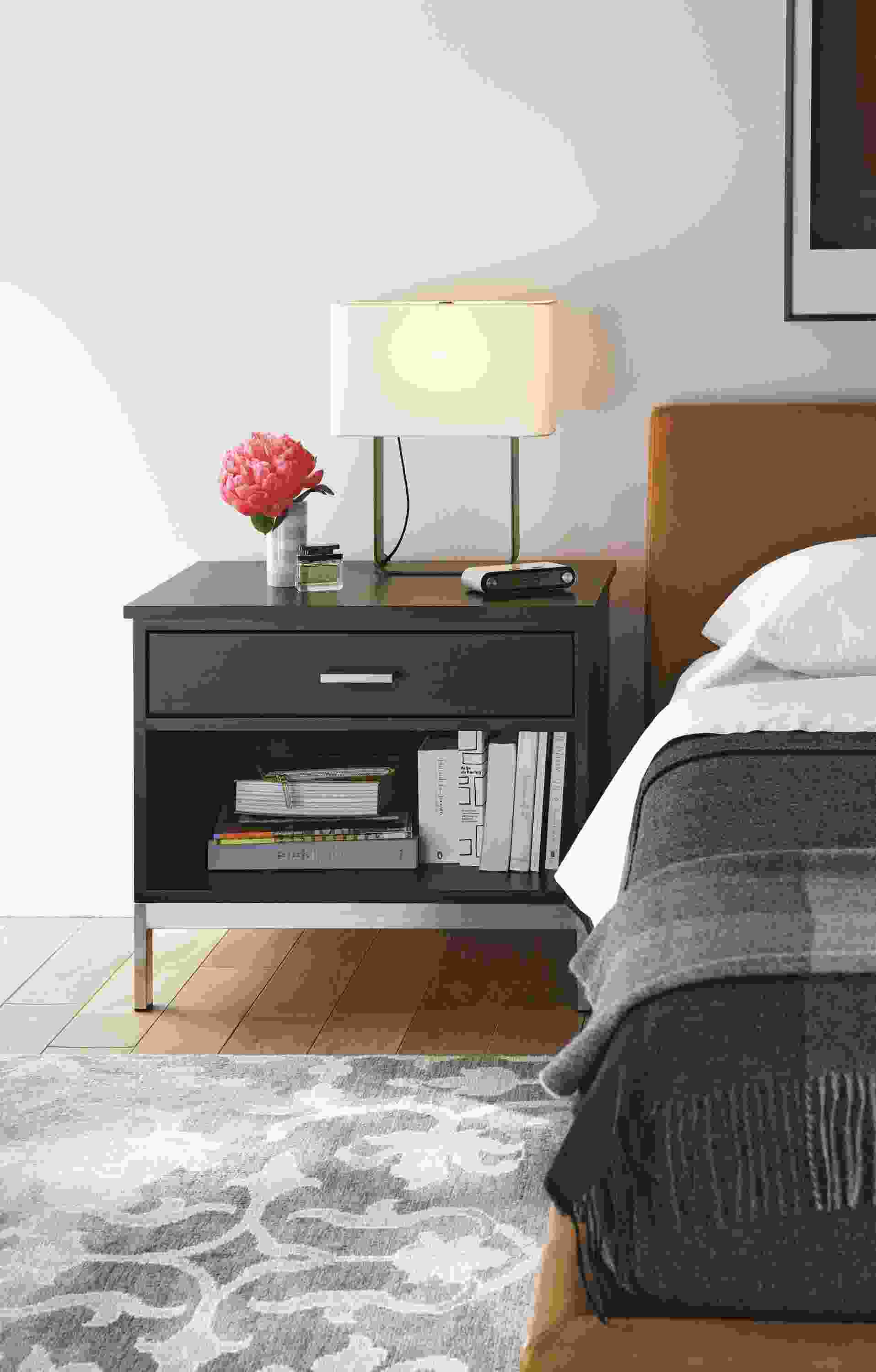 Bedroom with Linear nightstand with steel base in charcoal.