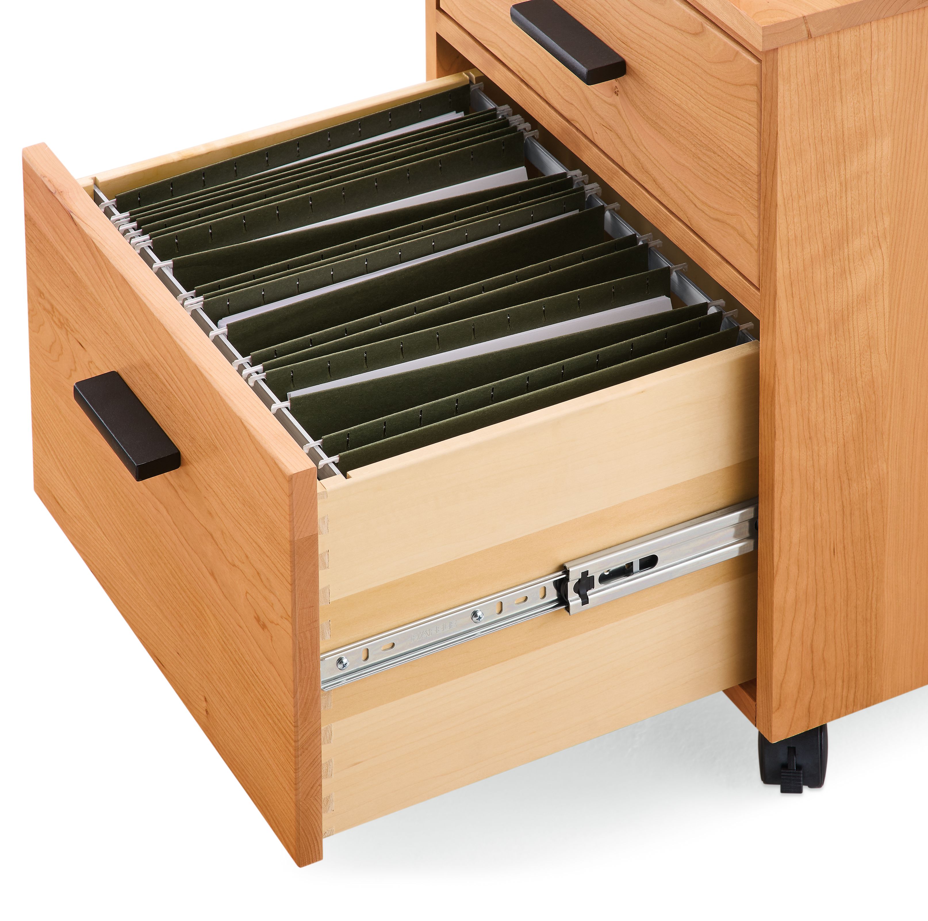 Detail of drawer slide mechanism on open drawer of Linear rolling file cabinet in cherry.