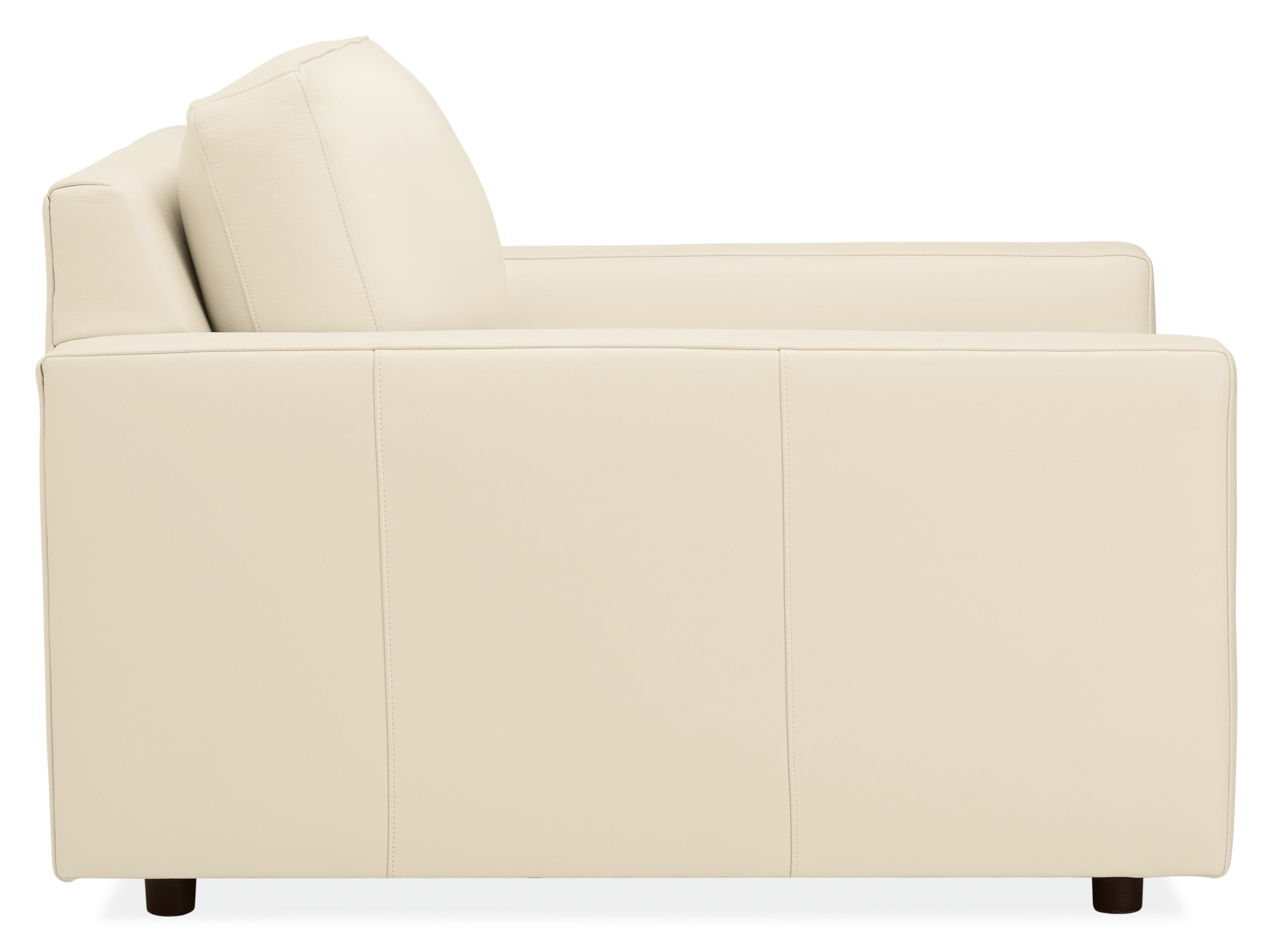 Side view of Linger chair in urbino ivory.