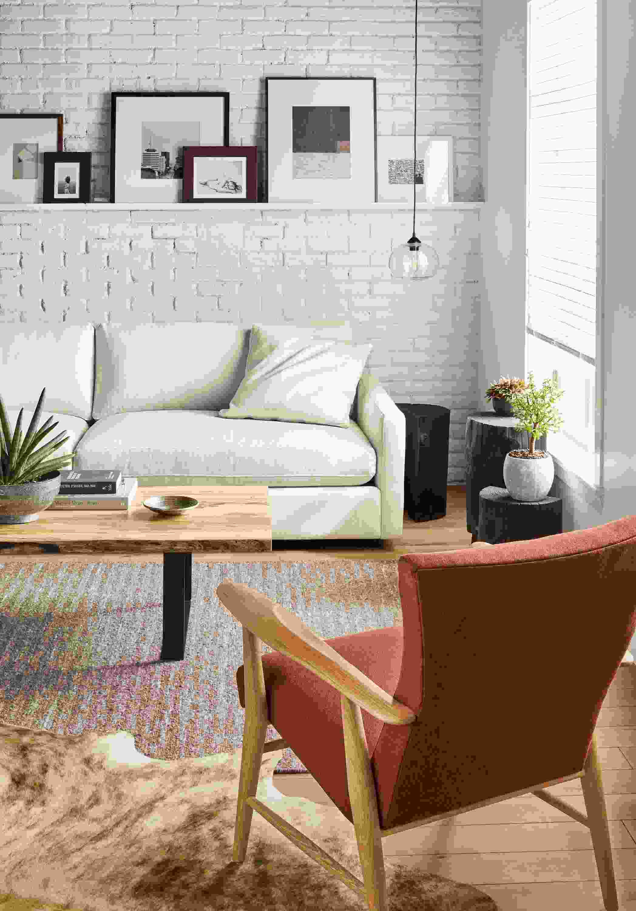 Living area with Linger Extra Deep 101-wide Sofa in Sumner Ivory Fabric, Chilton coffee table.
