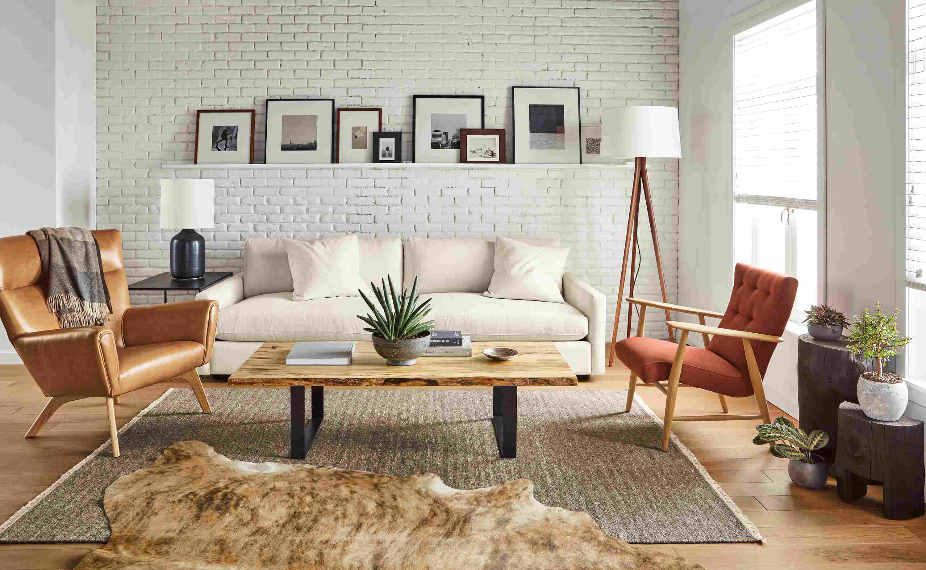 Living area with Linger Extra Deep 101-wide Sofa in Sumner Ivory Fabric, Chilton coffee table, Boden and Jonas chairs.