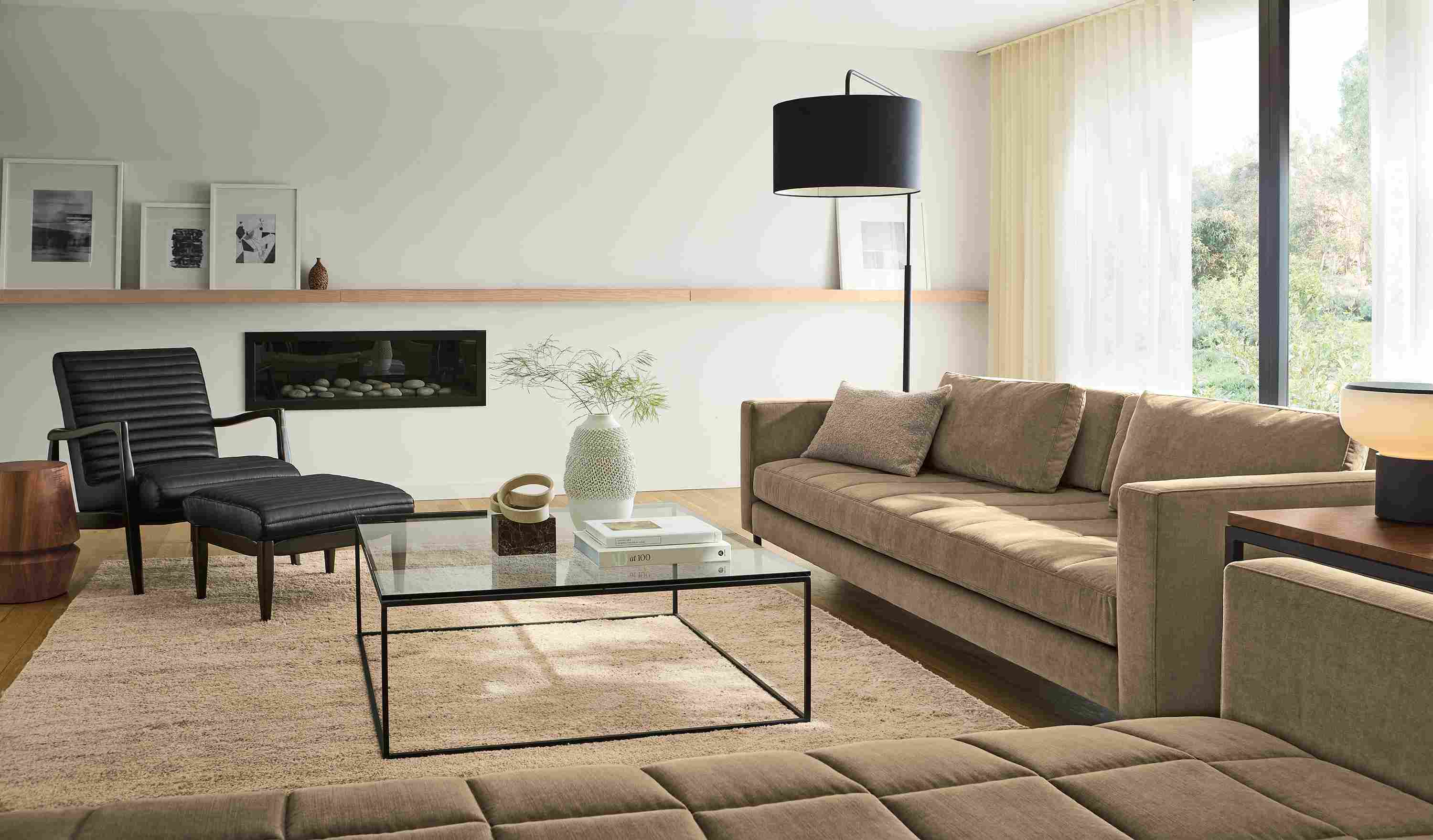Large living room with Lloyd 92-wide sofa and 83-wide daybed in Windsor Otter and Kalindi 8 by 10 rug in flax.