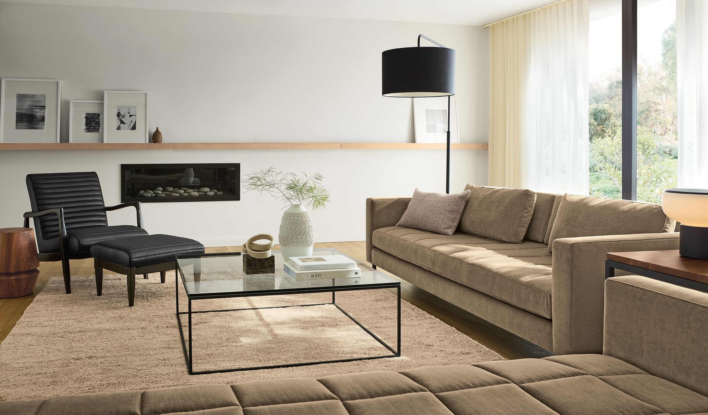 Large living room with Lloyd 92-wide sofa and 83-wide daybed in Windsor Otter and Kalindi 8 by 10 rug in flax.