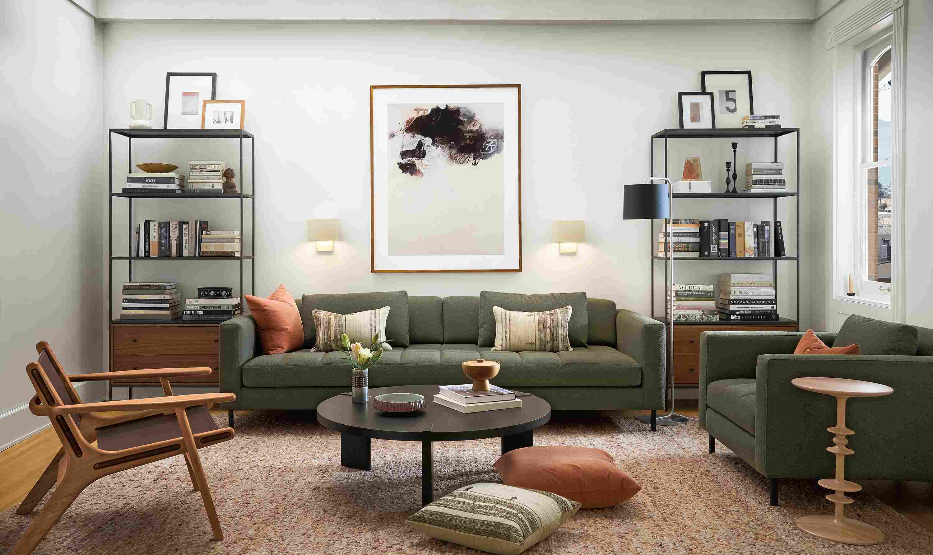 Living room with Lloyd sofa and chair in Declan Olive, Cobble rug in putty and Hanover coffee table in charcoal.