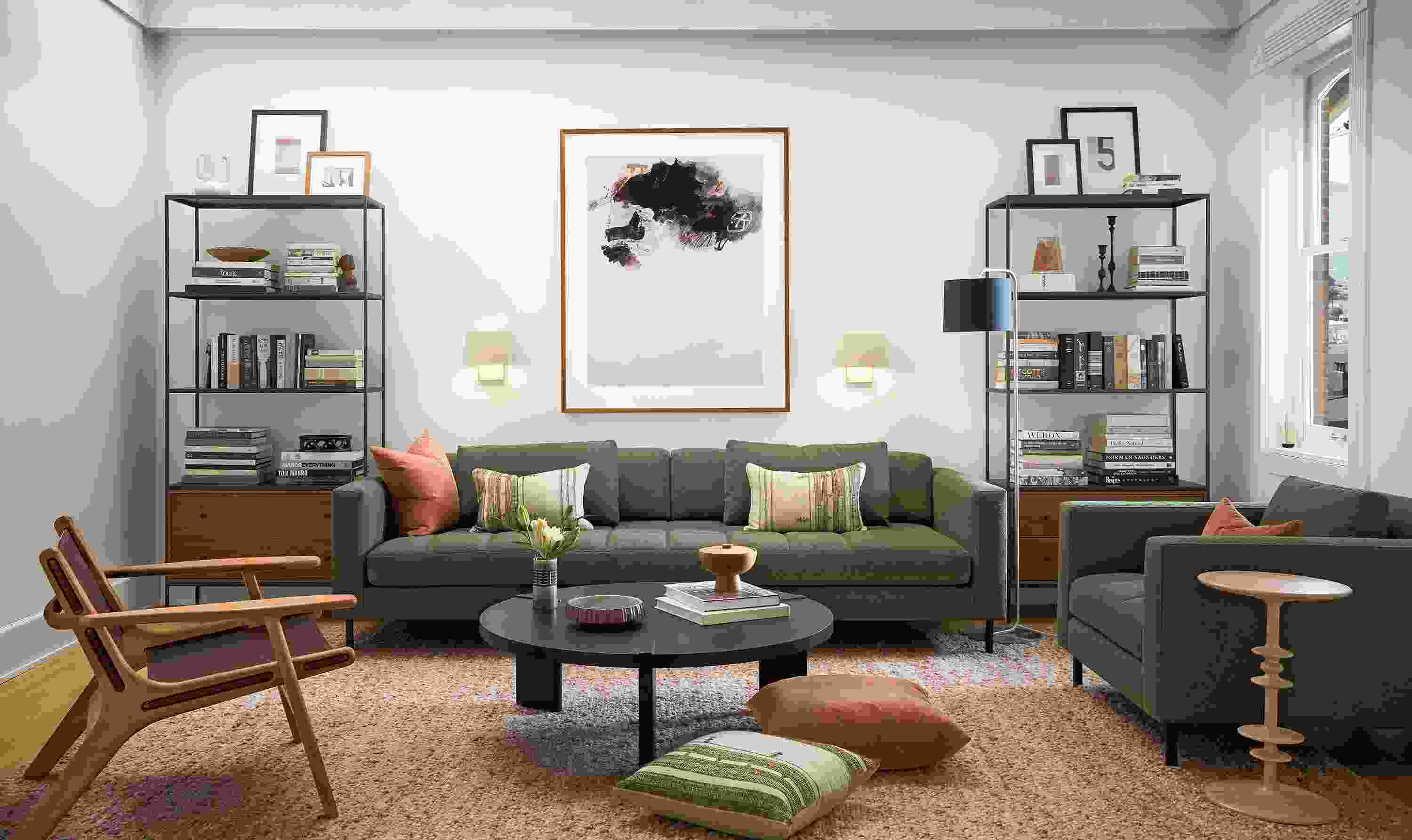 Living room with Lloyd sofa and chair in Declan Olive, Cobble rug in putty and Hanover coffee table in charcoal.