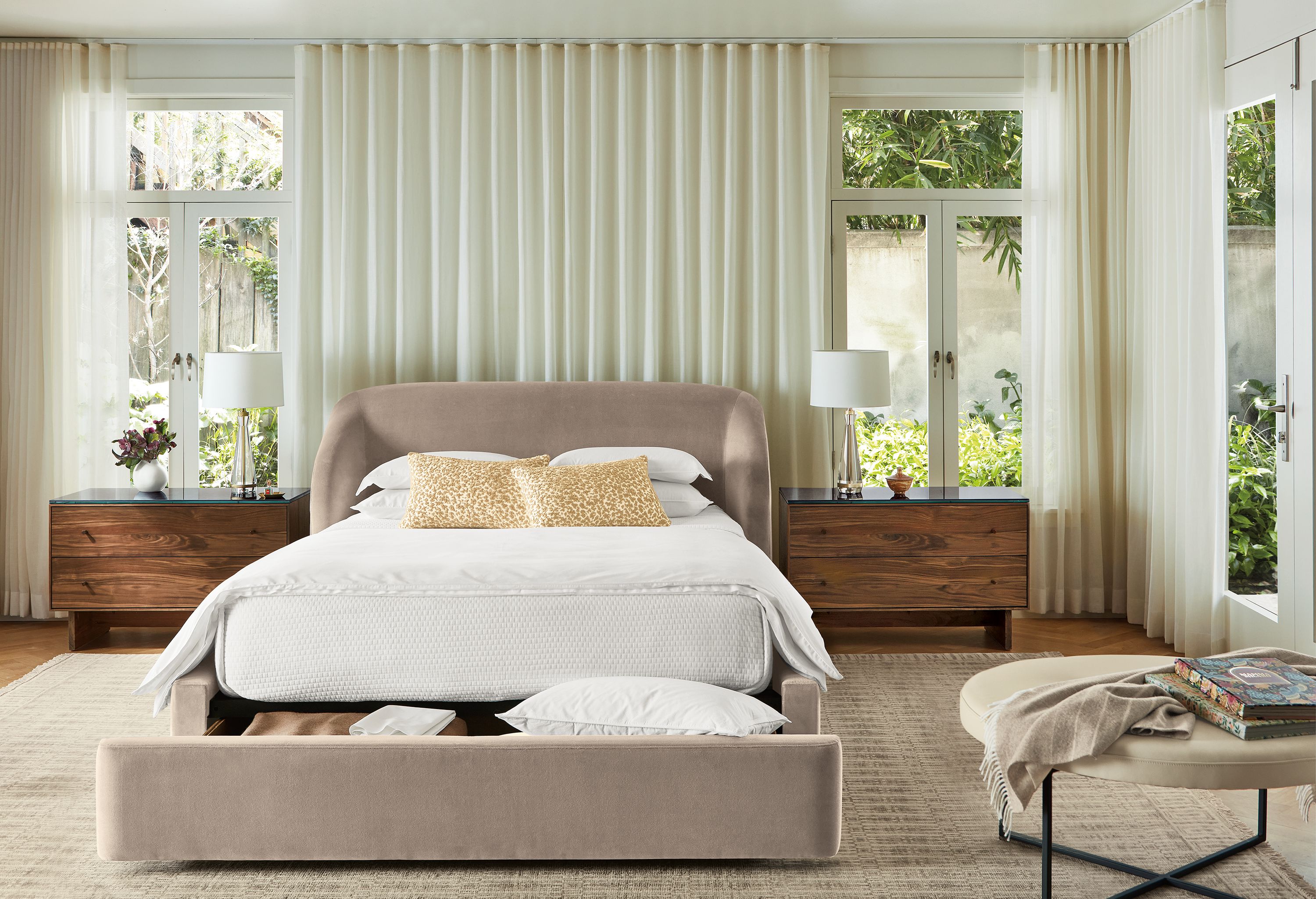 Bedroom with Loxley queen storage bed in Windsor Asphalt with storage drawer open and Tulum rug in taupe.
