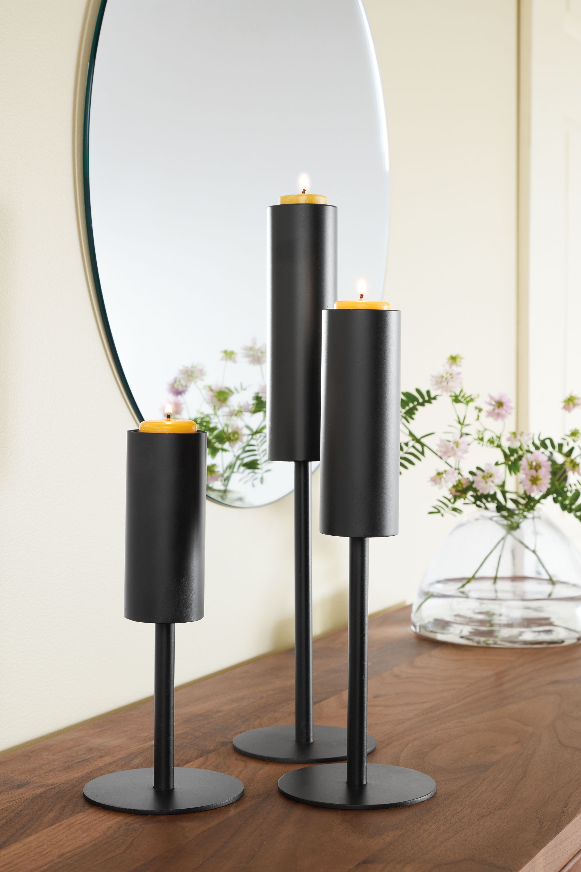 Detail of Lucent steel candle holders.