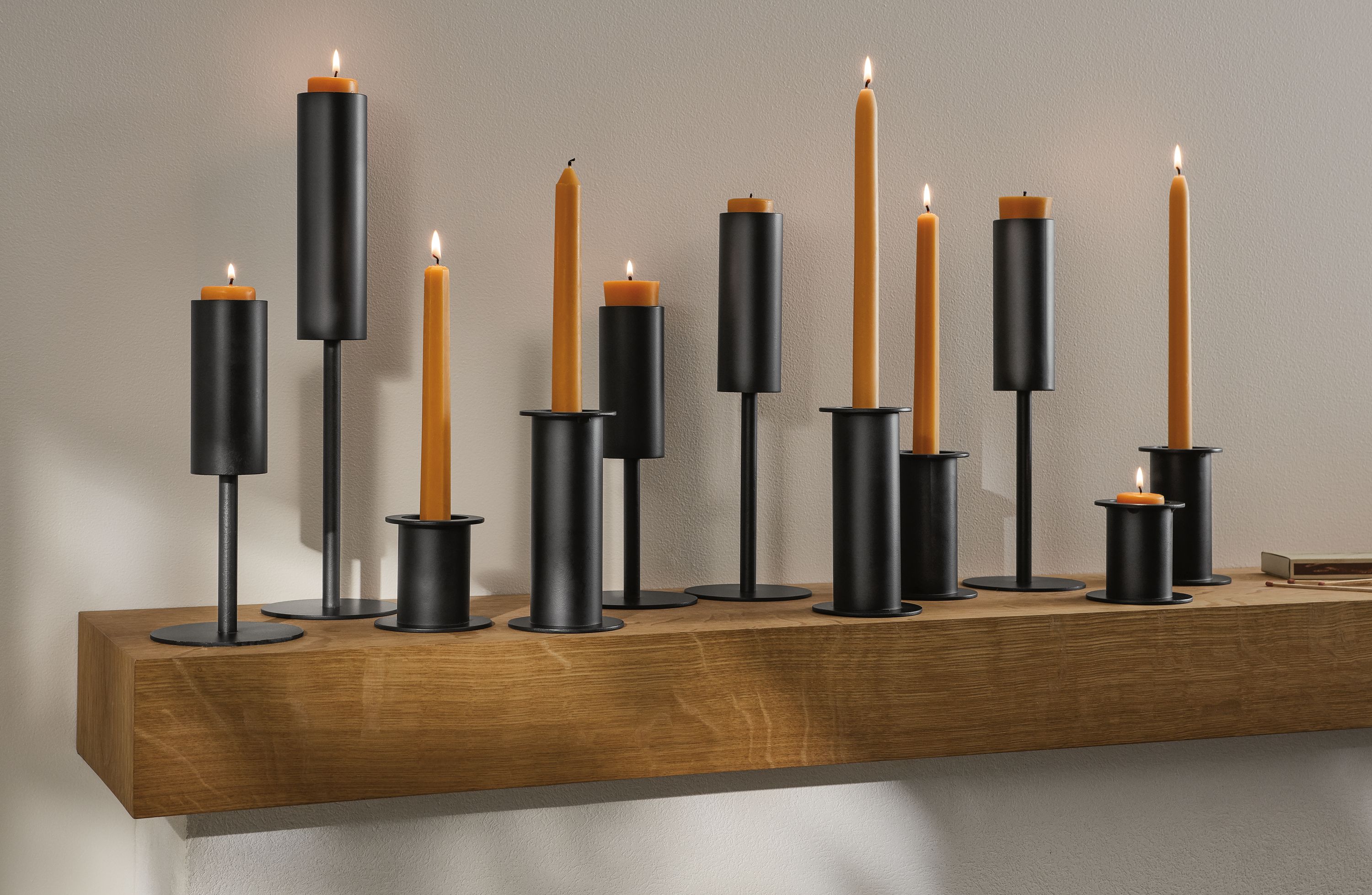 Detail of Lucent votives on mantle.