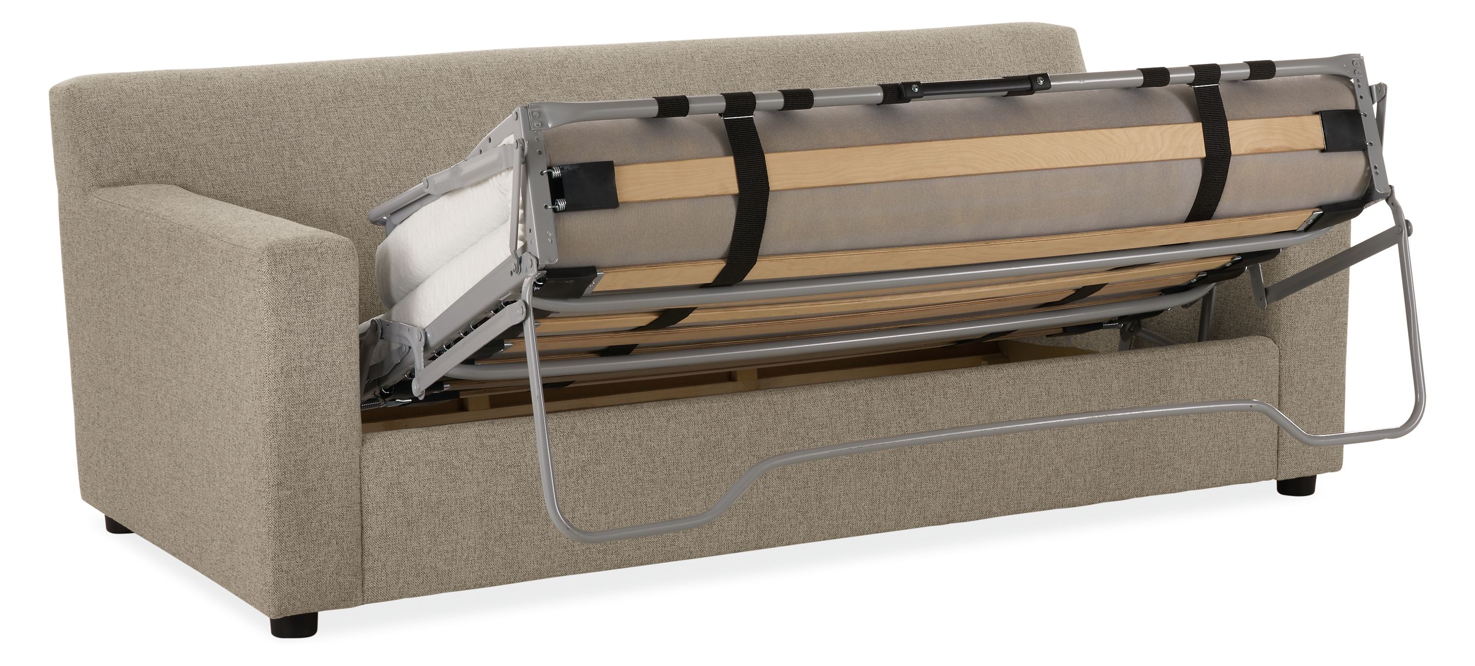 Ludlow wide arm pull-out queen sleeper sofa in tatum grey showing sleeper bed partially open.