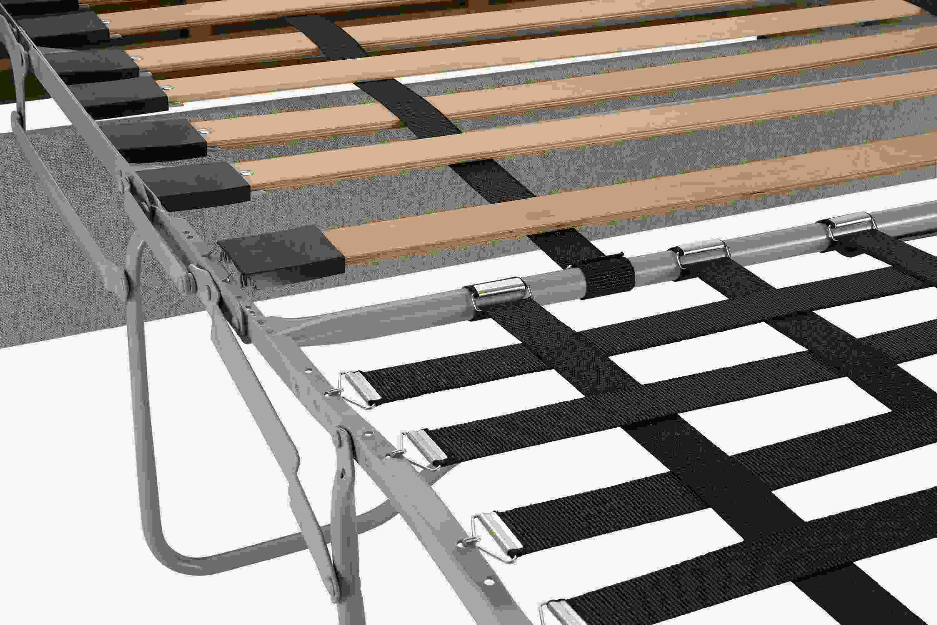 Detail of bed frame and supports on Ludlow wide arm queen sleeper sofa in Tatum Grey.