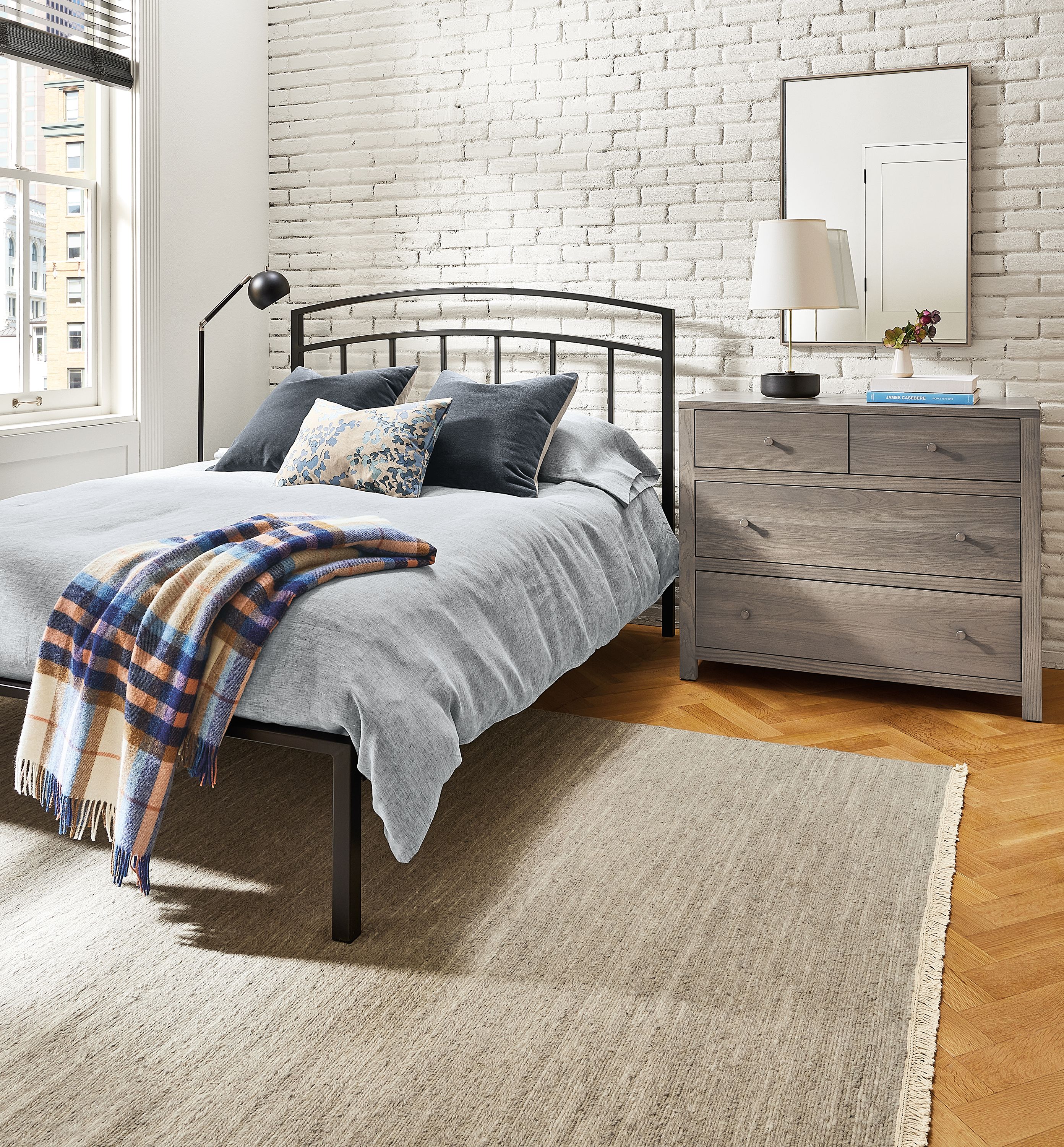 Bedroom with Luka queen bed, Corwin dresser, Dia rug.