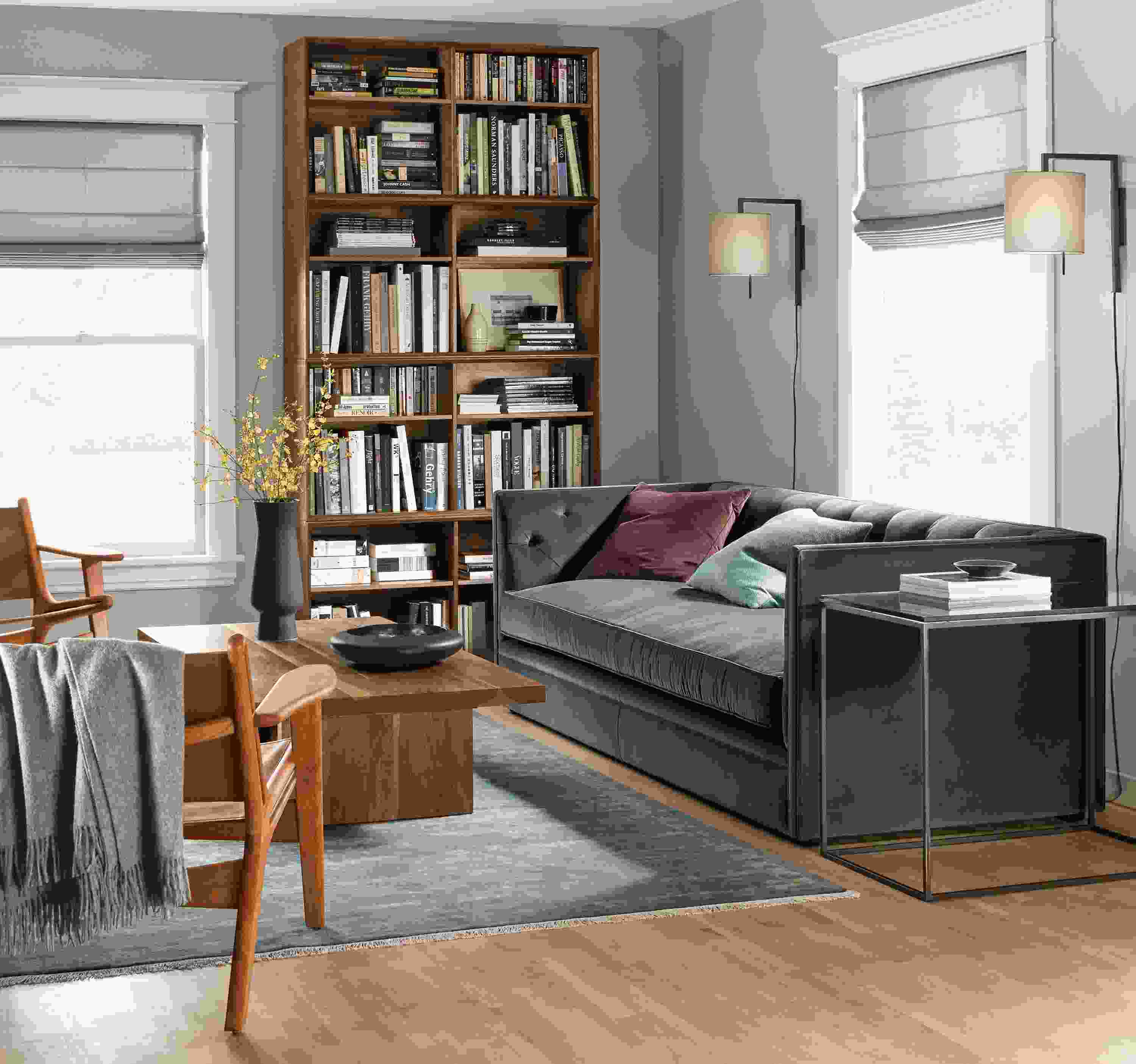 Living room with Macalester sofa in Vance Charcoal and 2 Lars chairs in cherry and Sellare Cognac.