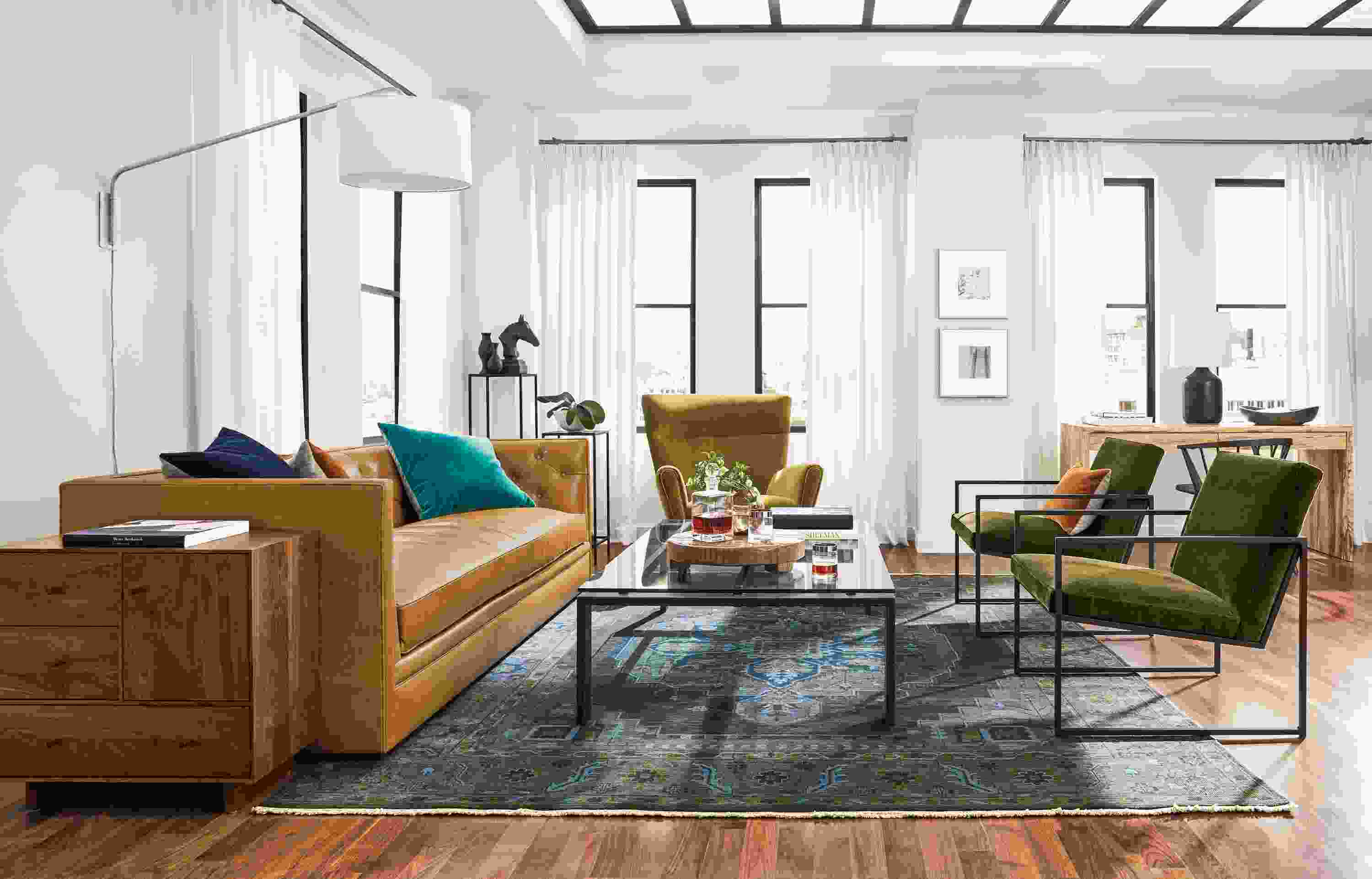 Living room with Macalester sofa in Portofino Cognac, 2 Novato chairs in Vance Olive and Boden chair in Vance Mustard.