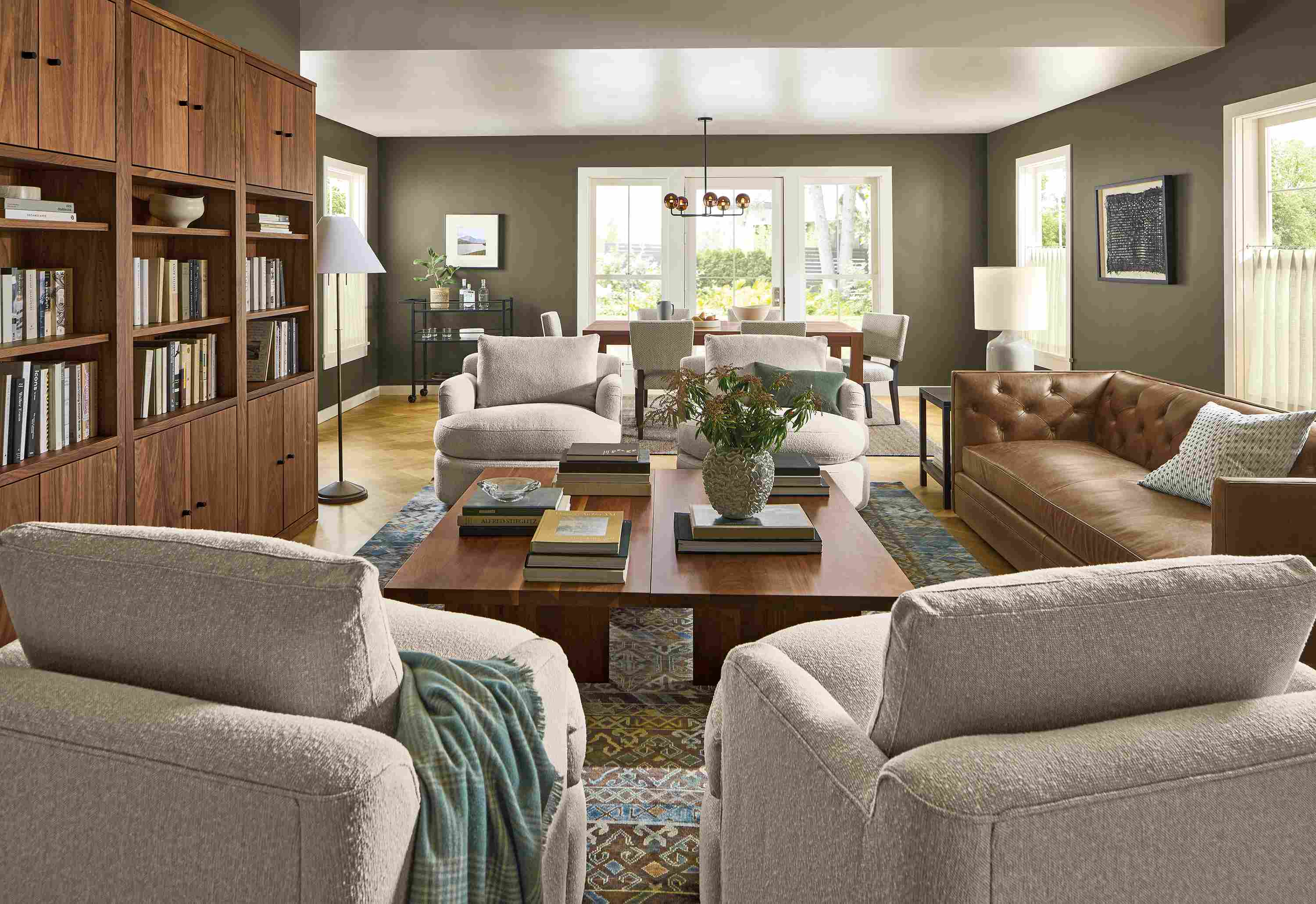 Large living room with Macalester sofa in Palermo Bourbon leather, and 4 Sonja swivel chairs.