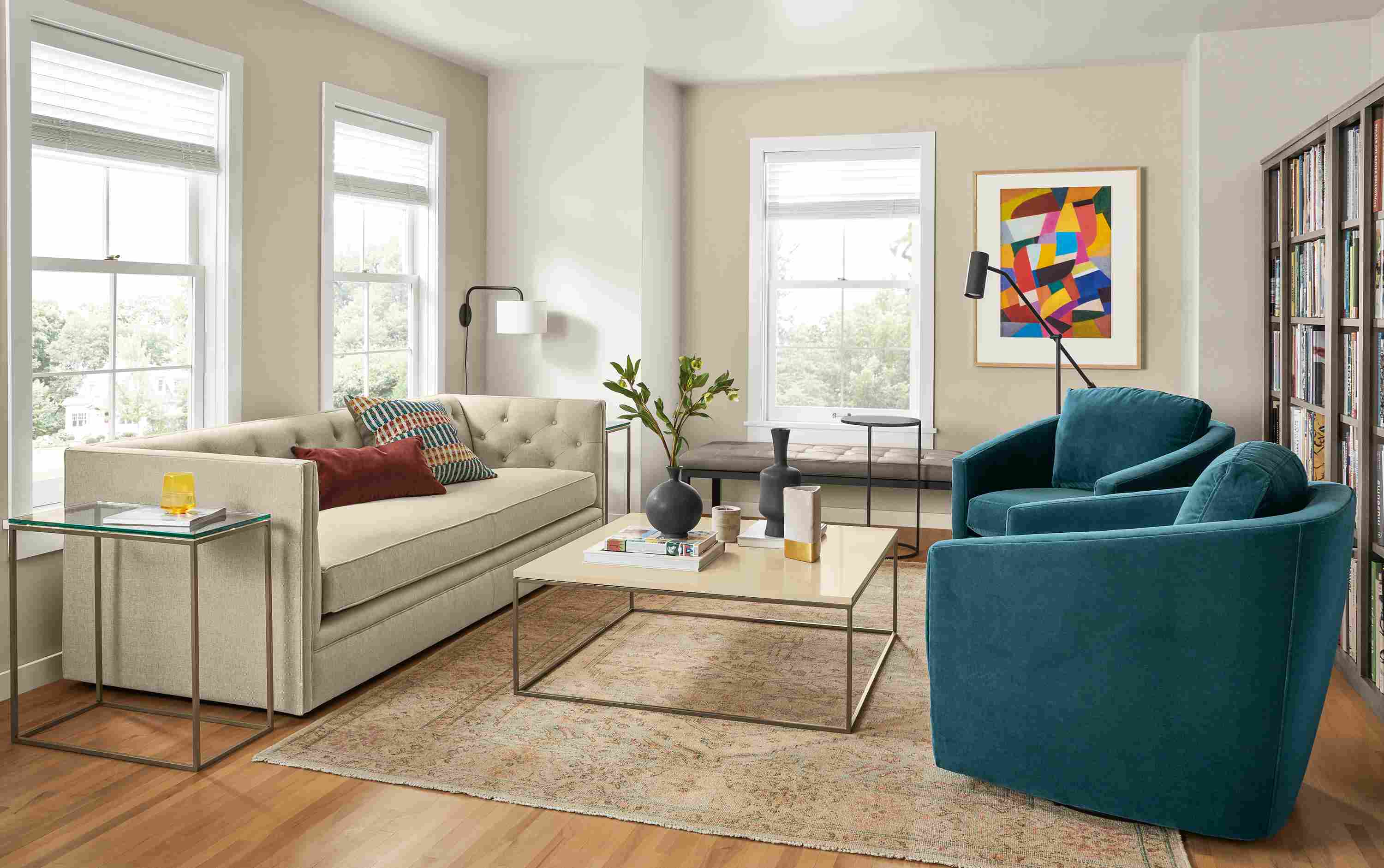 Macalester sofa in Sumner Linen, 2 Ford swivel chairs in Banks Lagoon Tyne coffee table in mineral.