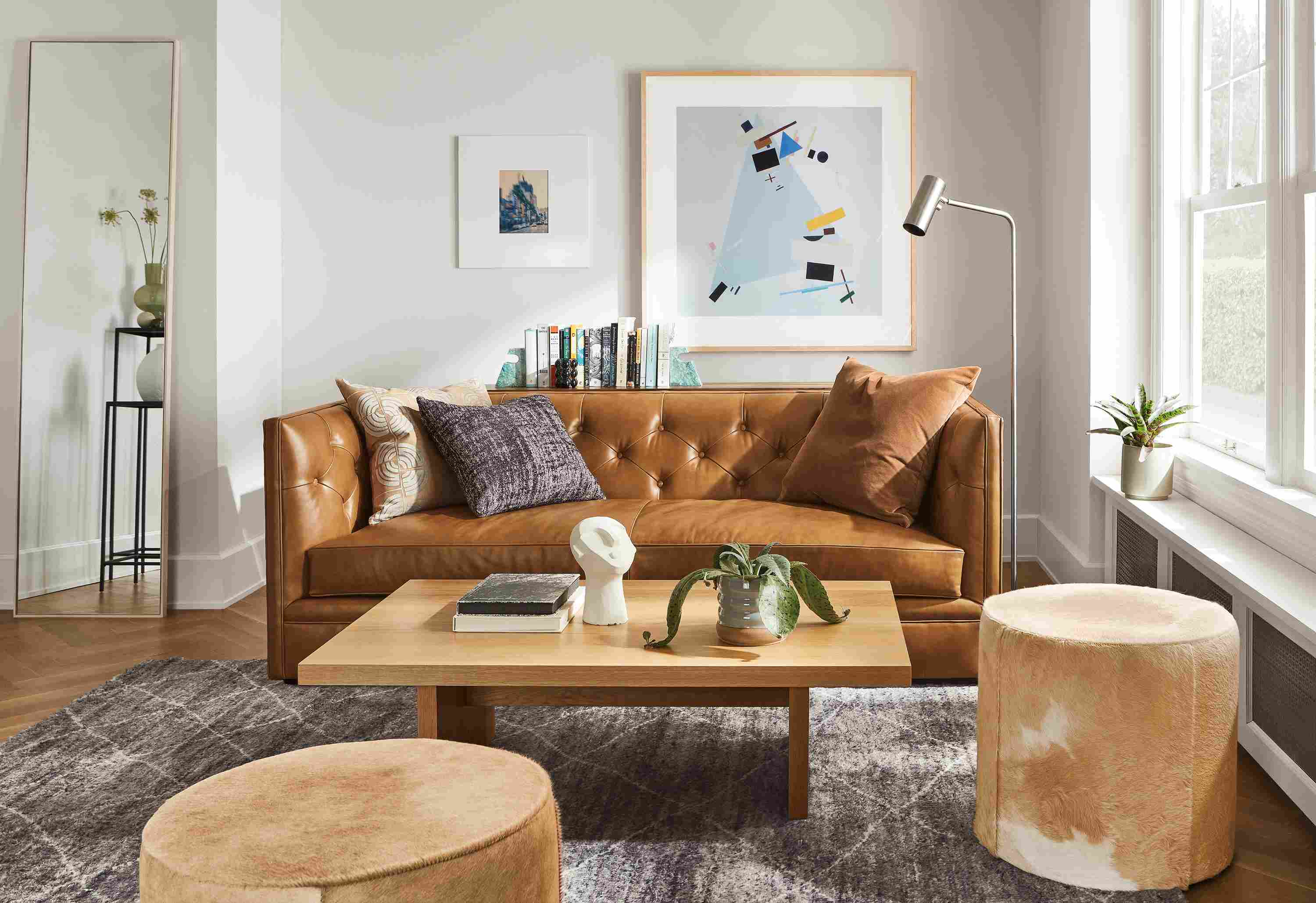 Living room with Macalester 80-wide sofa in Portofino Cognac, Corbett coffee table in white oak and Kalindi rug in charcoal.