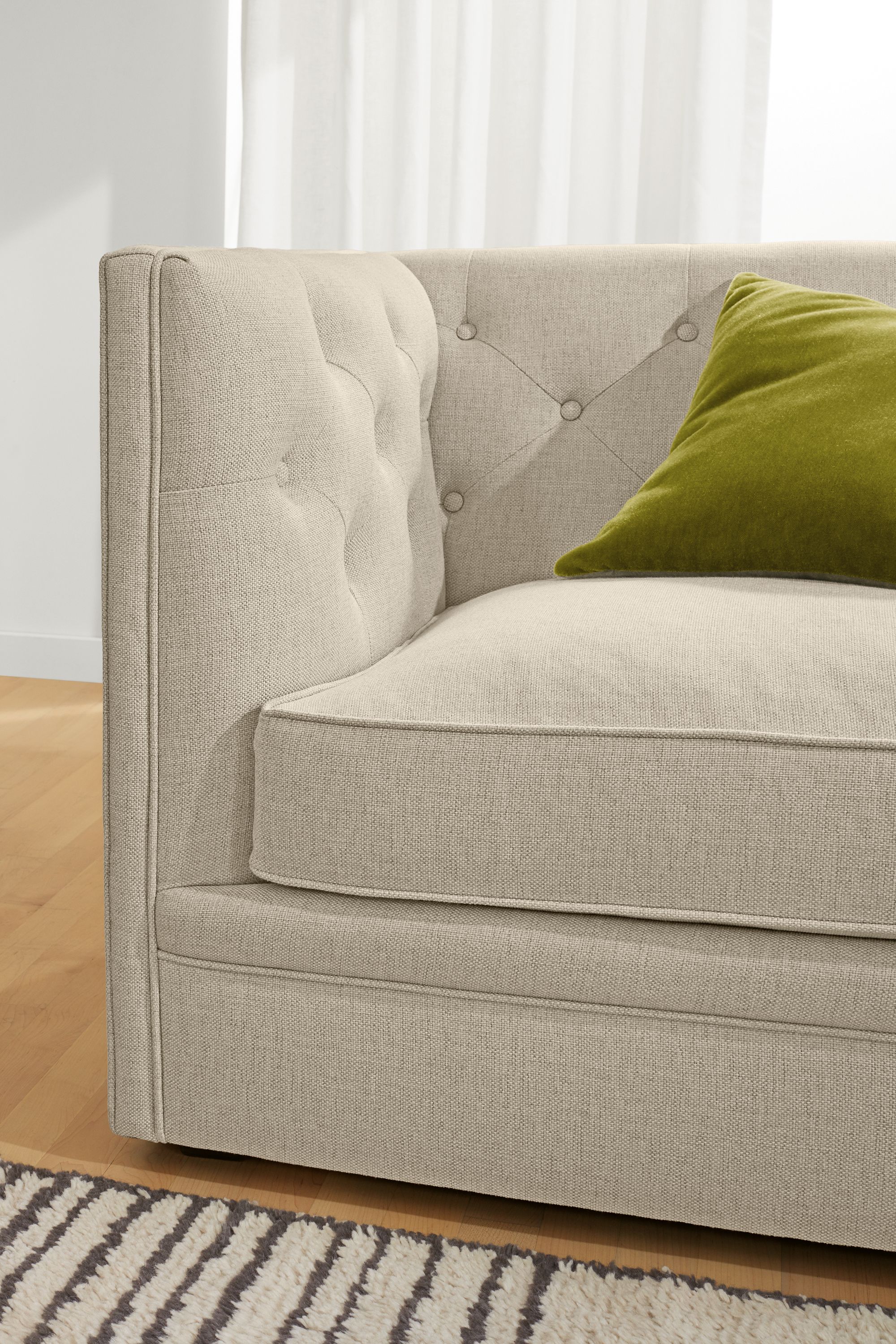 Living room with detail of Macalester sofa in sumner linen.