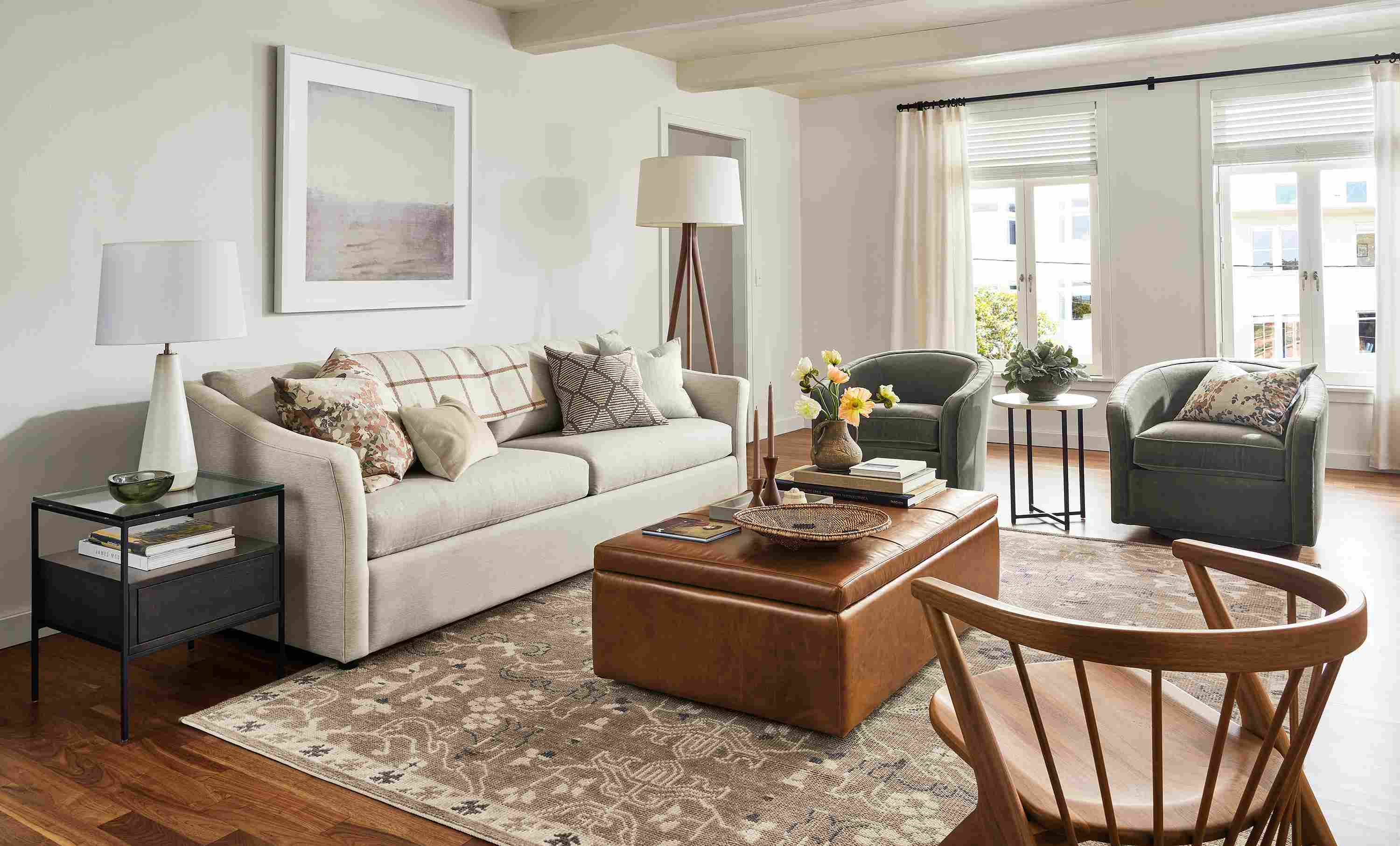 Living room with Maeve sofa in Yana natural, Lind storage ottoman in Vento Cognac, Soren lounge chair.
