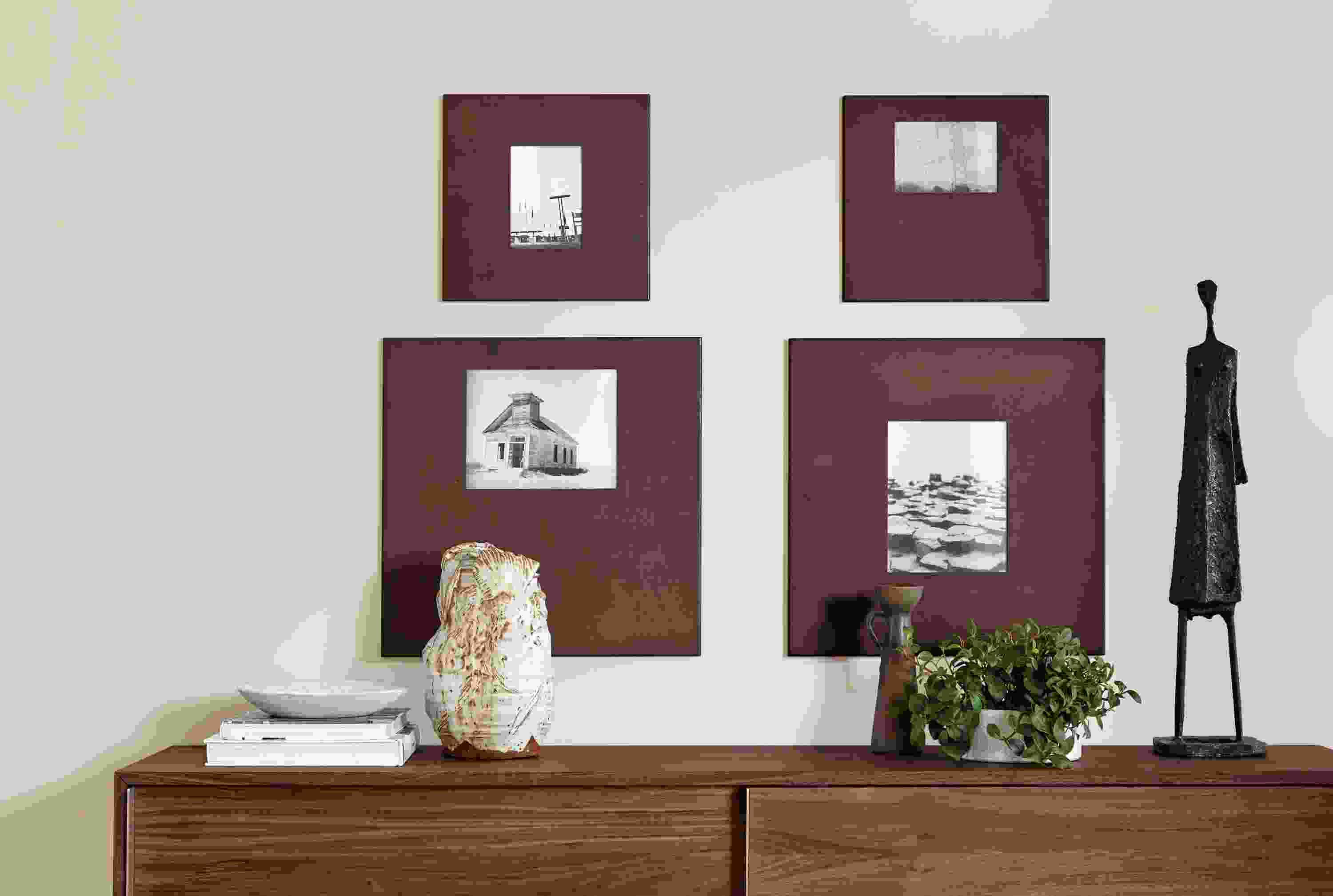 Living room with 4 Manhattan box frames in patina finish.