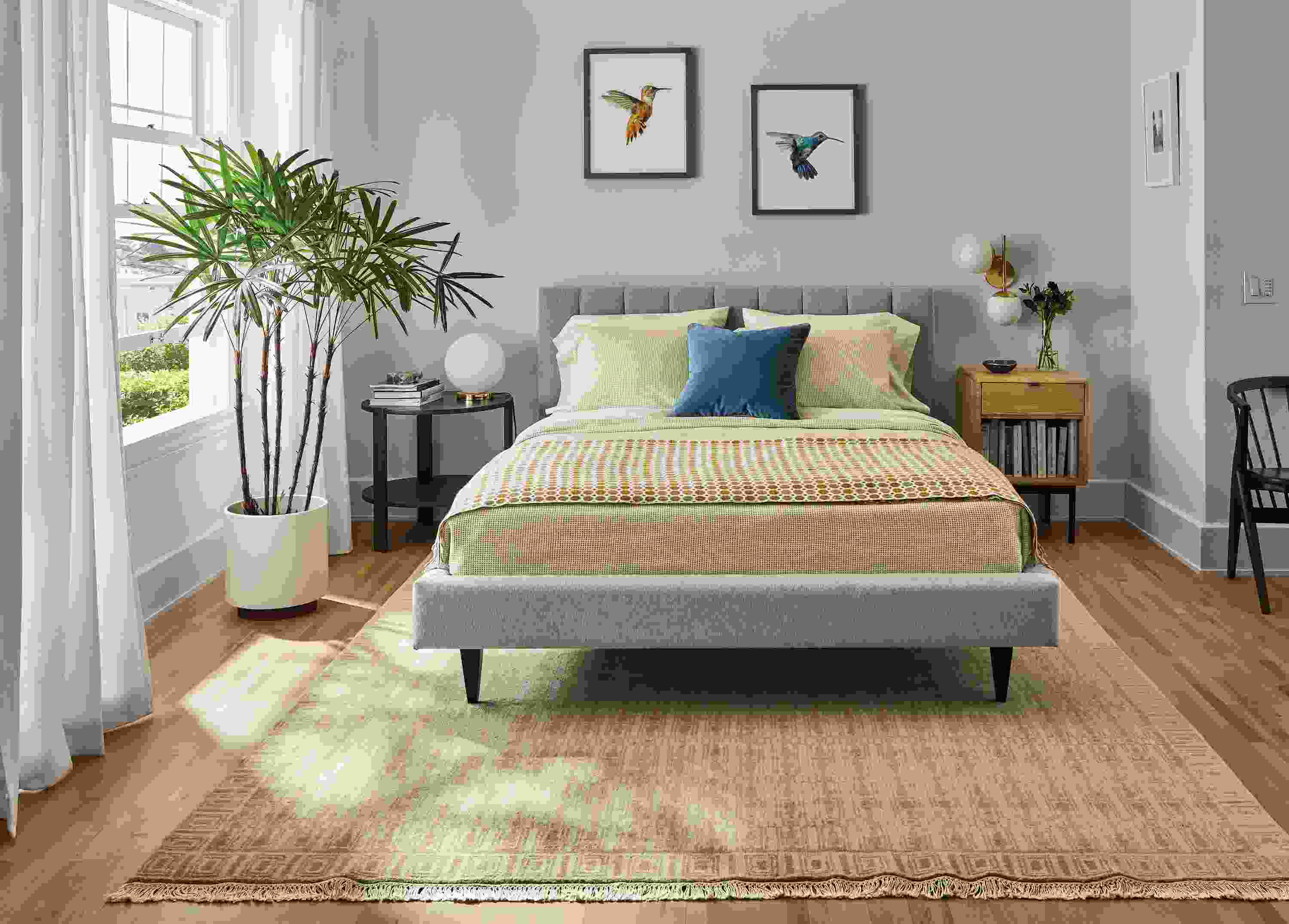 Bedroom with Mara coverlet and sham in citron/ivory, Hartley bed in Flint Ivory and Tulum rug in wheat.