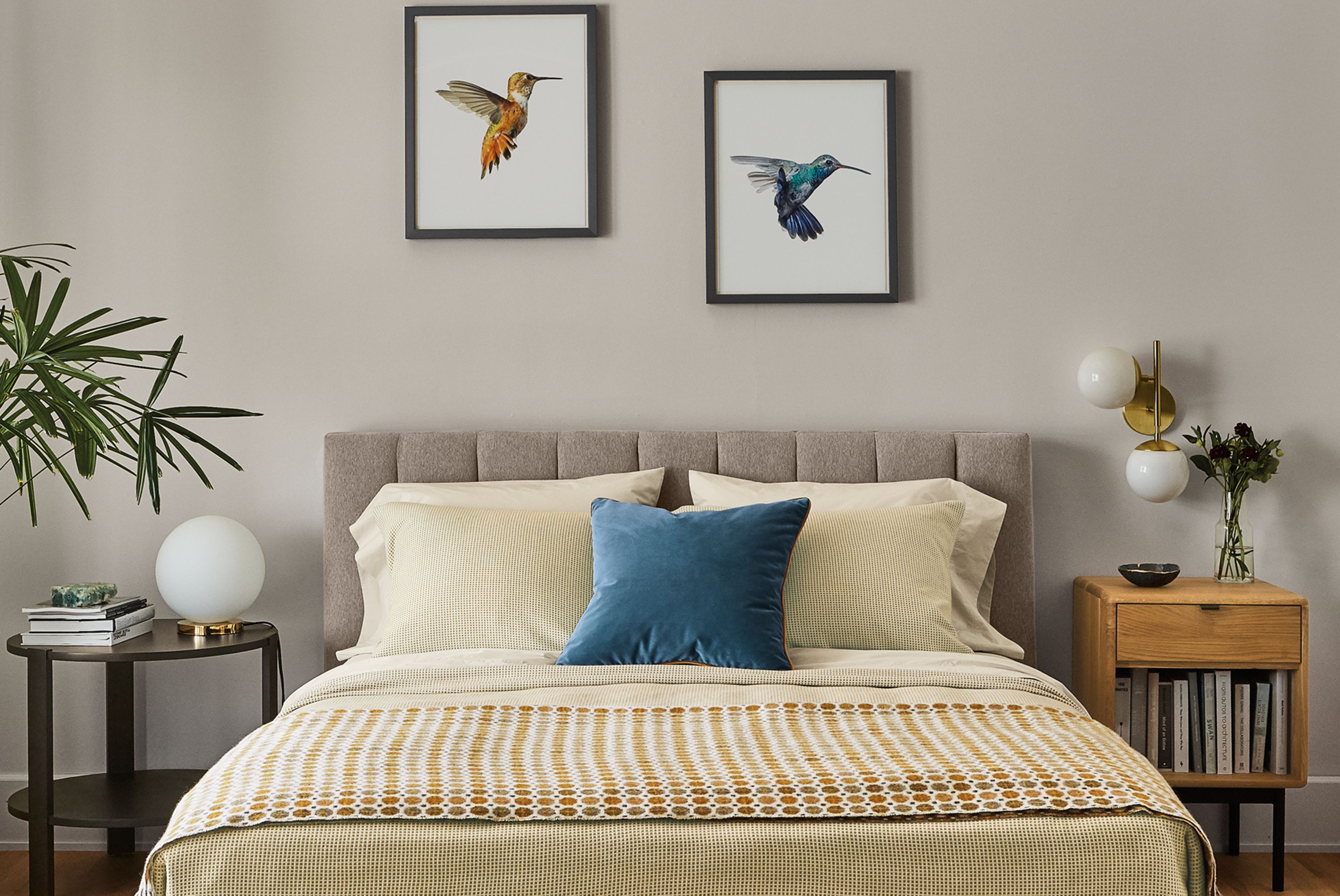 Bedroom with Mara coverlet and sham in citron/ivory, Hartley bed in Flint Ivory and Tulum rug in wheat.