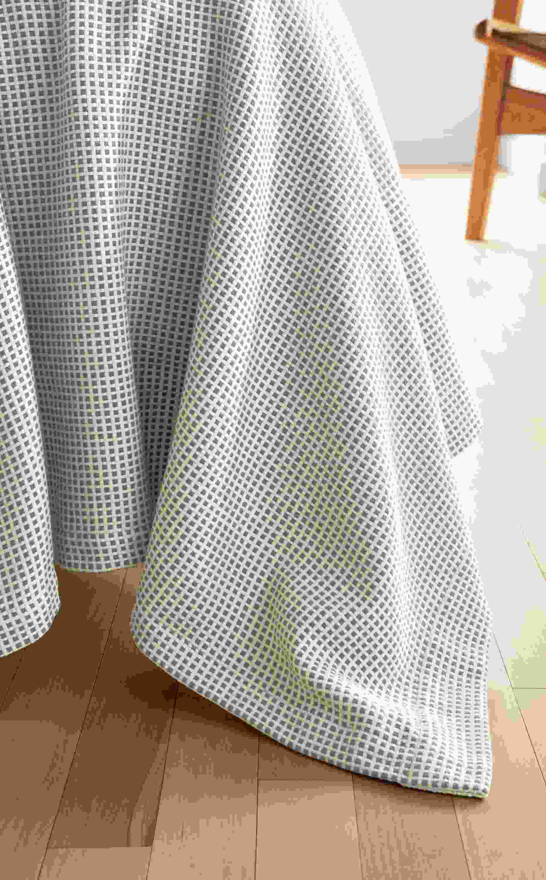 Detail of Mara coverlet in ivory.