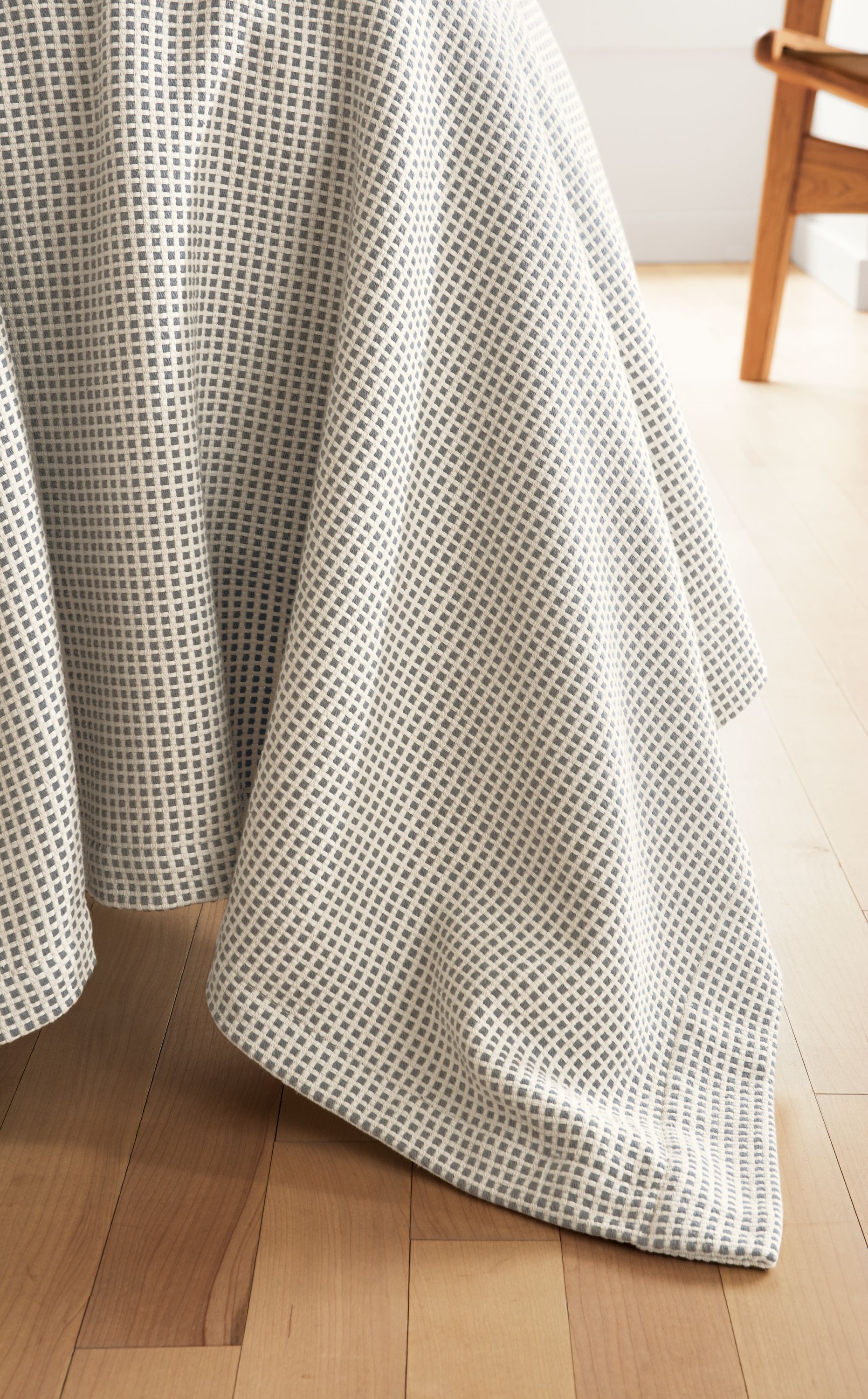 Detail of Mara coverlet in ivory.