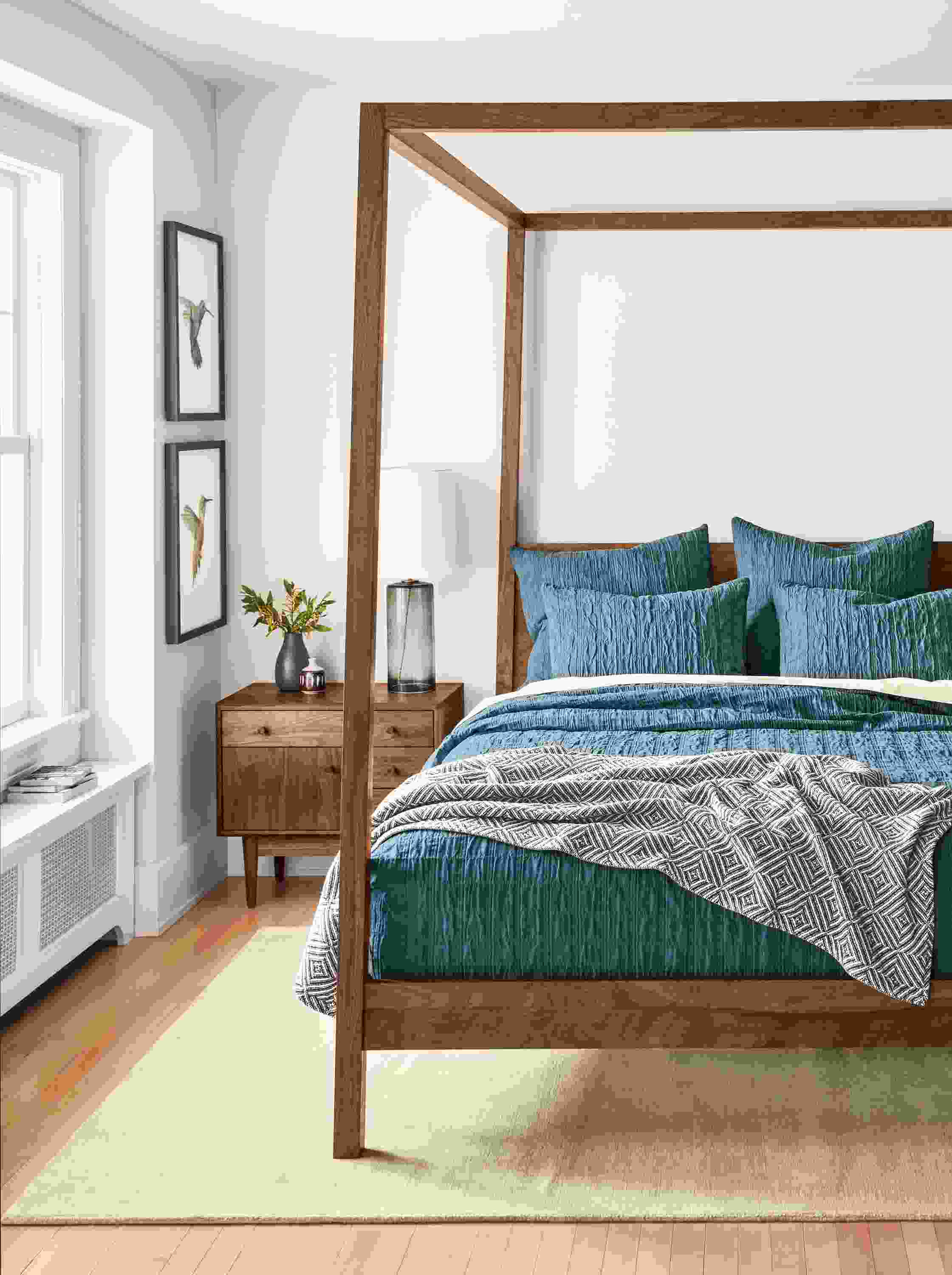Bedroom with Marley coverlet and shams in Haze, Hale queen bed and grove nightstand in walnut.