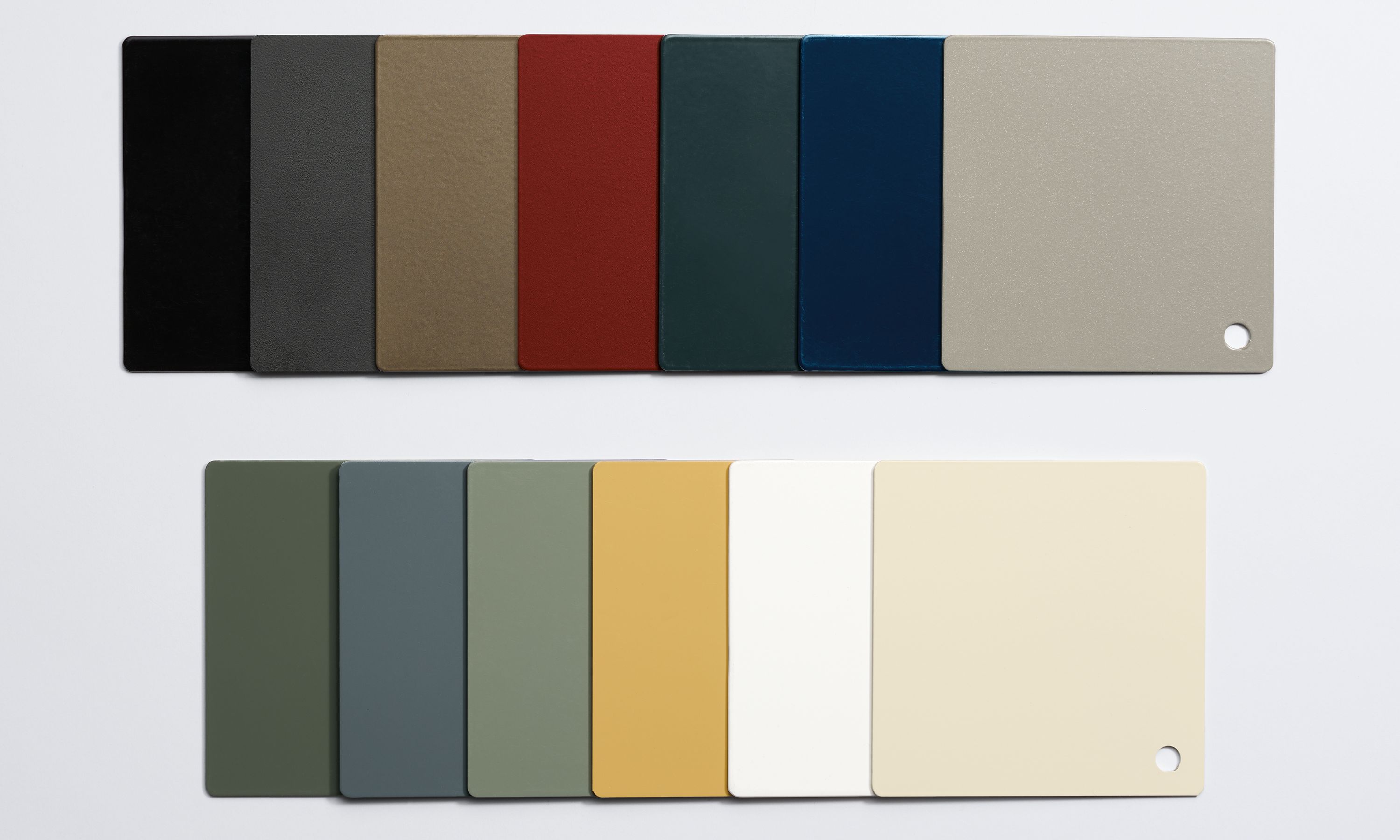 Group shot of powdercoat finishes in various colors.