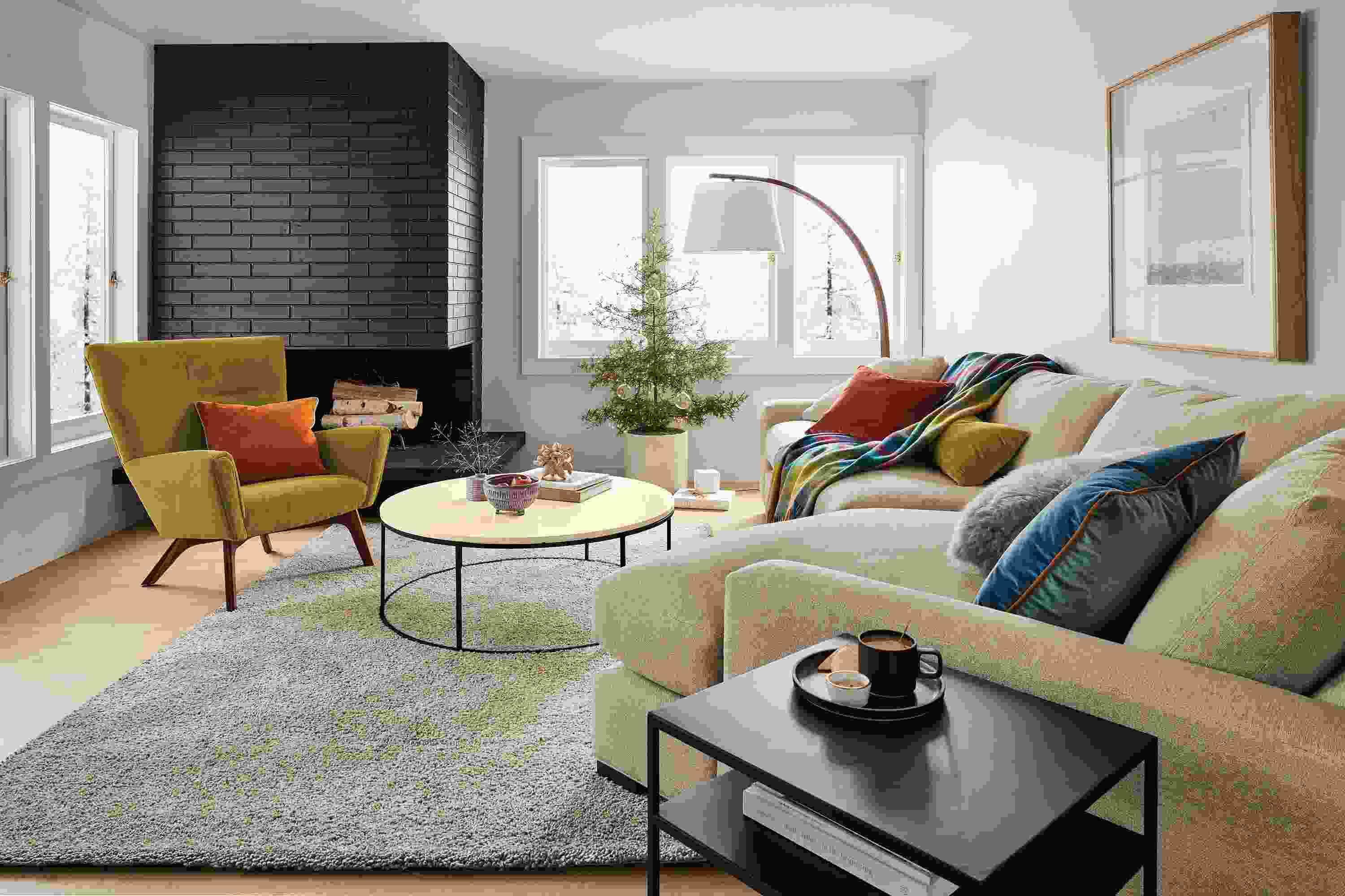 Room setting with a Metro Deep 149-wide Sofa with Right-Arm Angled Chaise in Tatum Fabric and a Boden Chair in Vance Fabric.