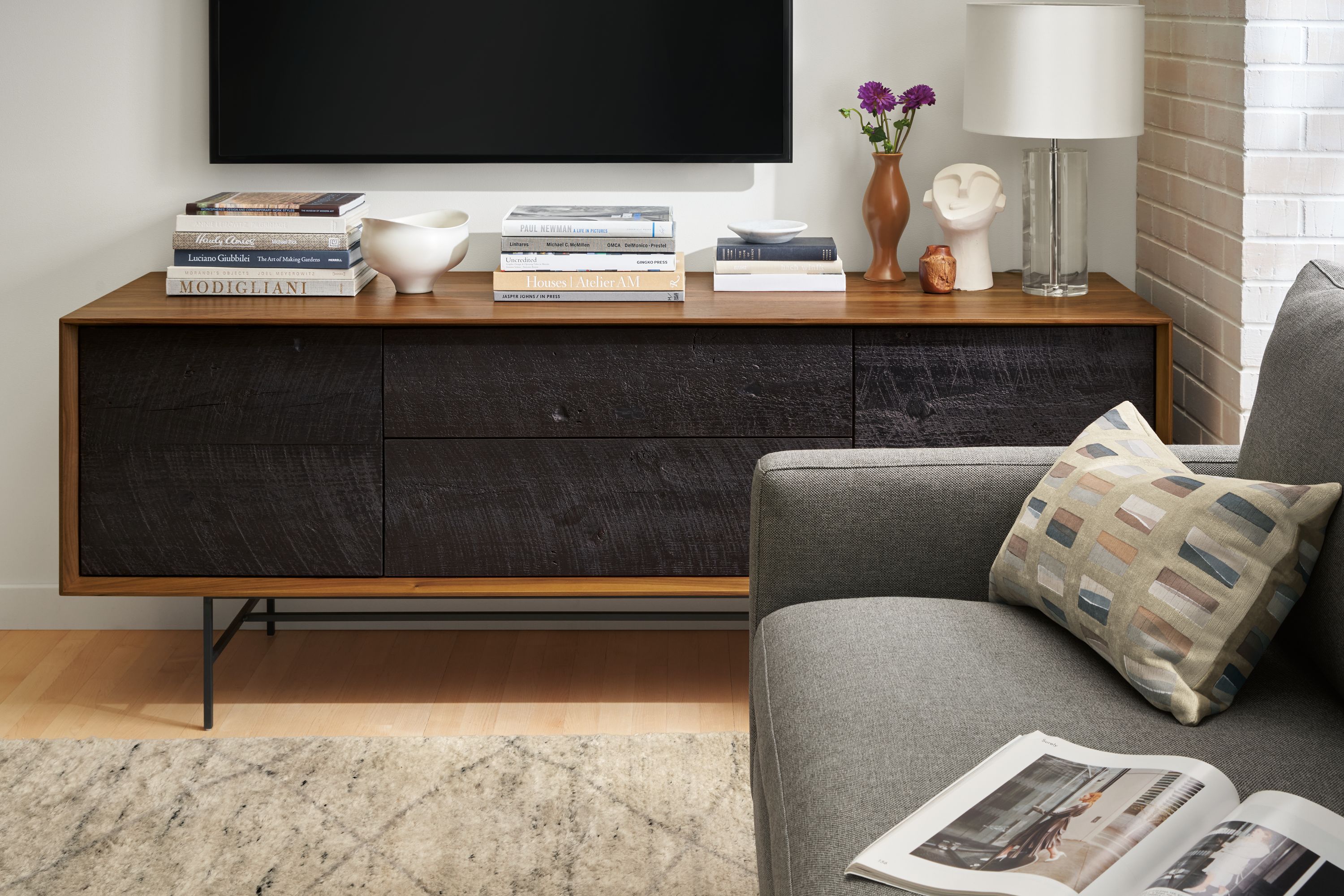 Close-up of the McKean 72-wide Reclaimed Wood Media Cabinet in Walnut case and Charcoal doors.