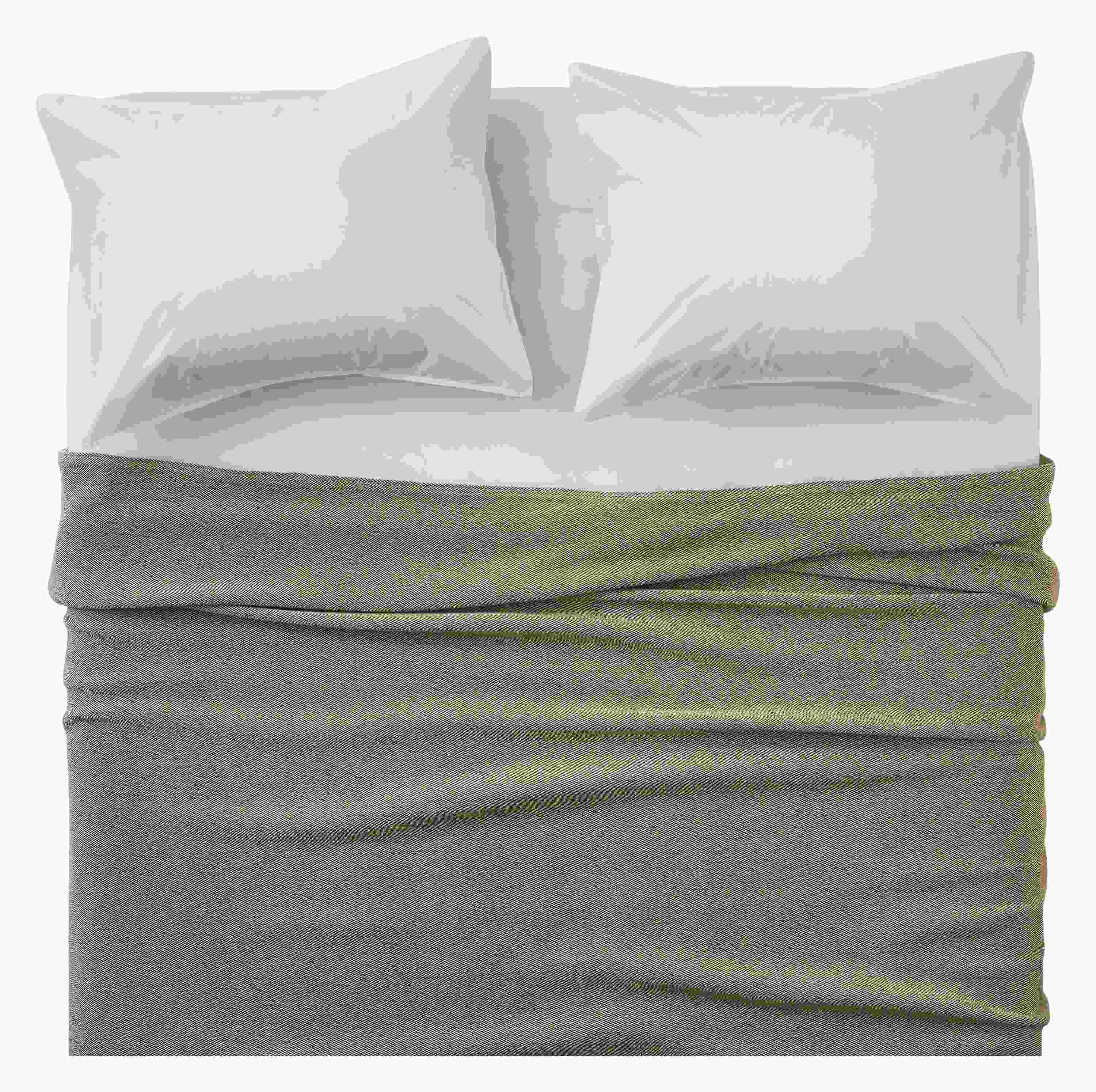 Overhead view of Mercer washable wool full/queen blanket in Earth on a bed with signature percale sheets and sham in white.