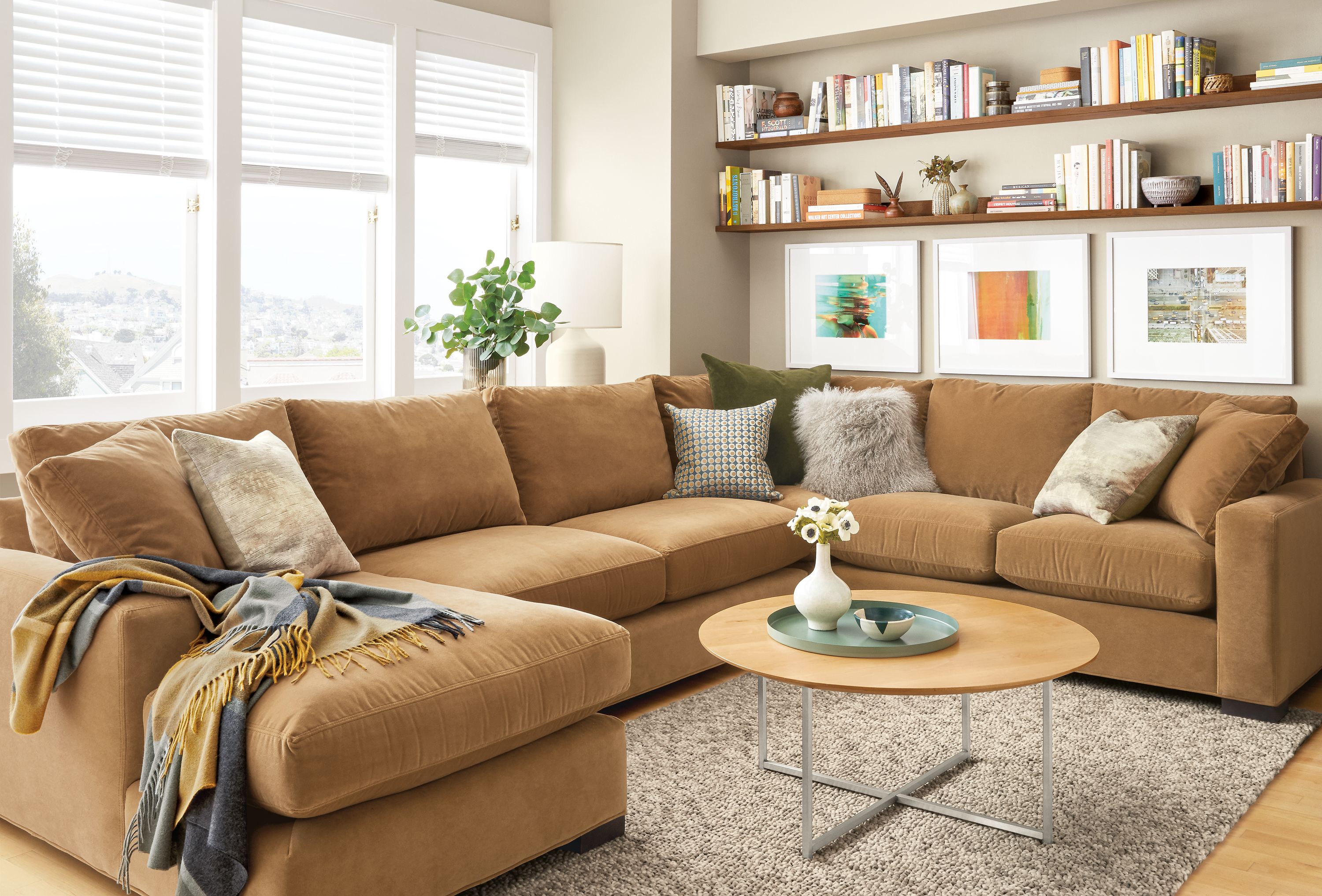 Detail of large Metro sectional in Banks Camel velvet in living room.