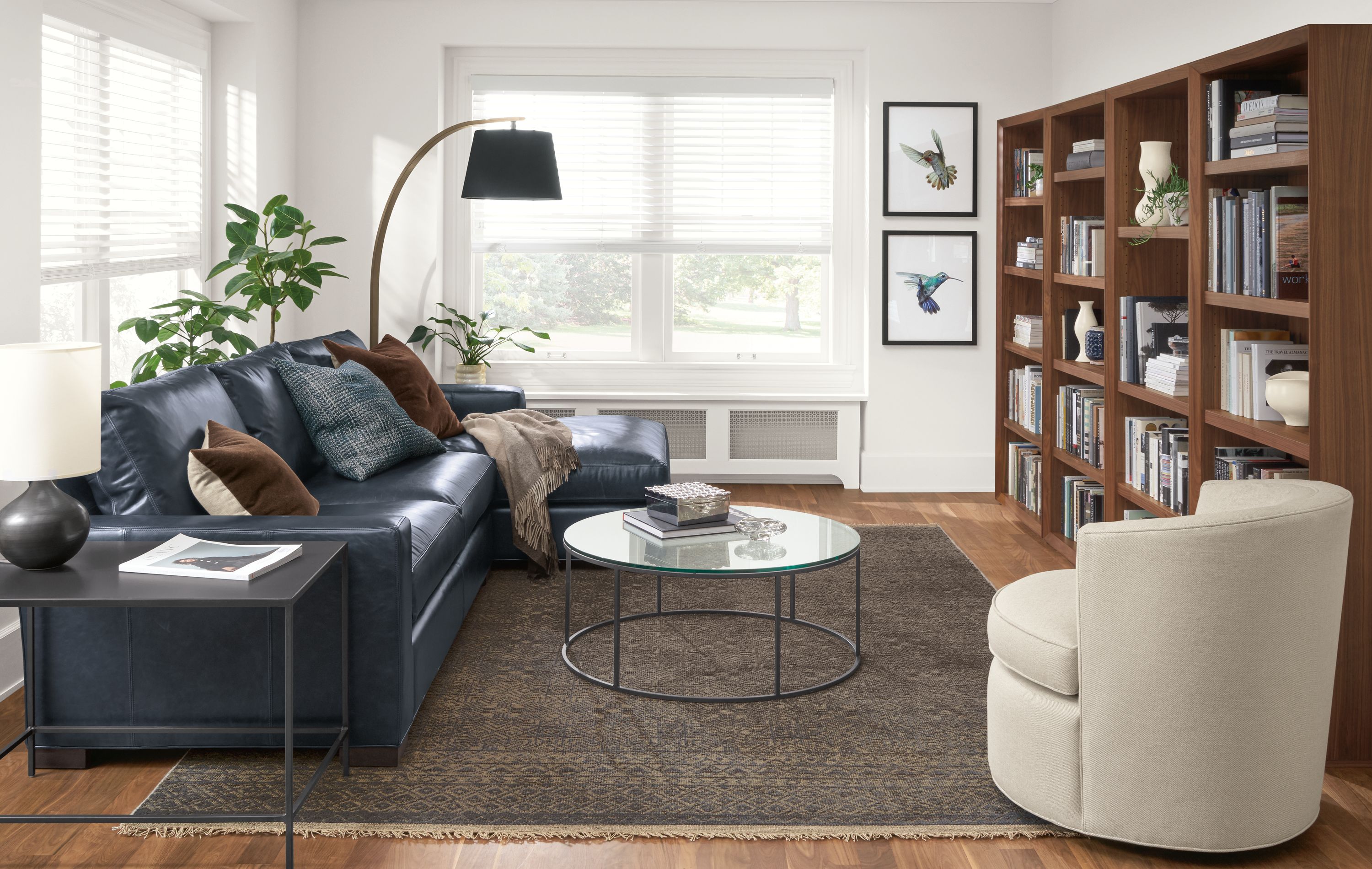 Side view of Metro sofa in Portofino Ink leather in living room.