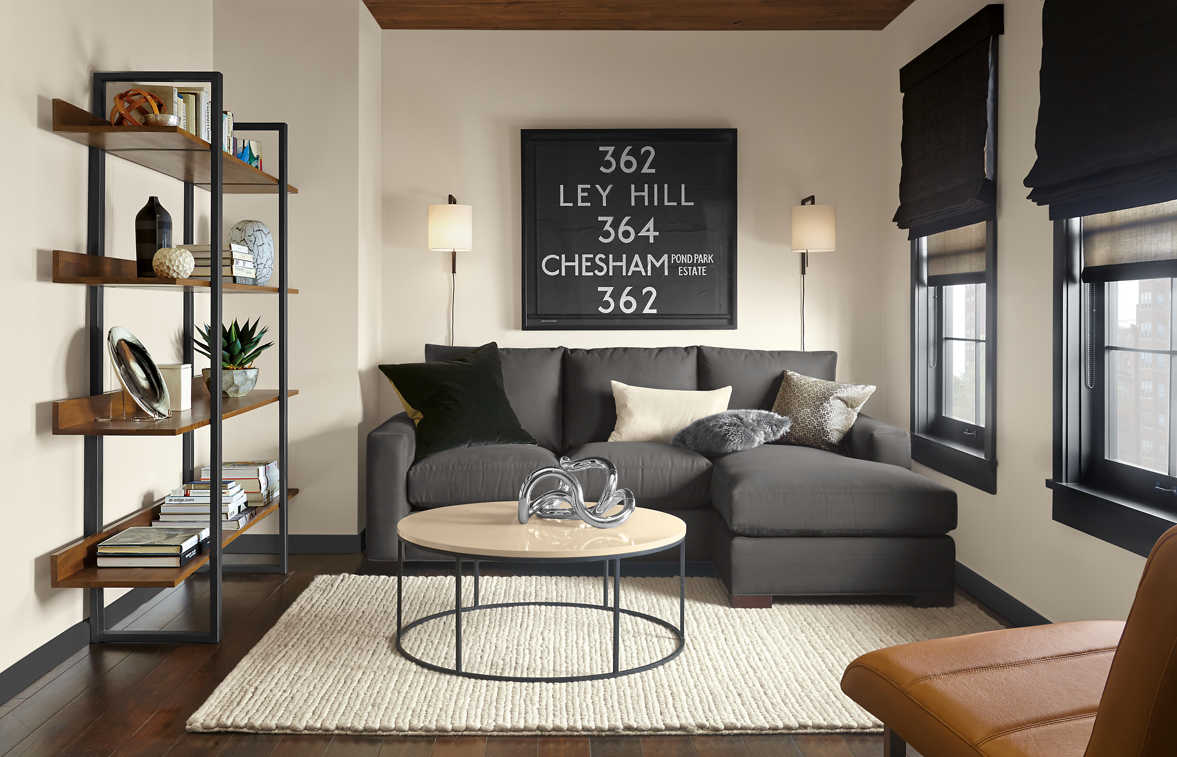 Living room with Metro sofa with reversible chaise in desmond charcoal.