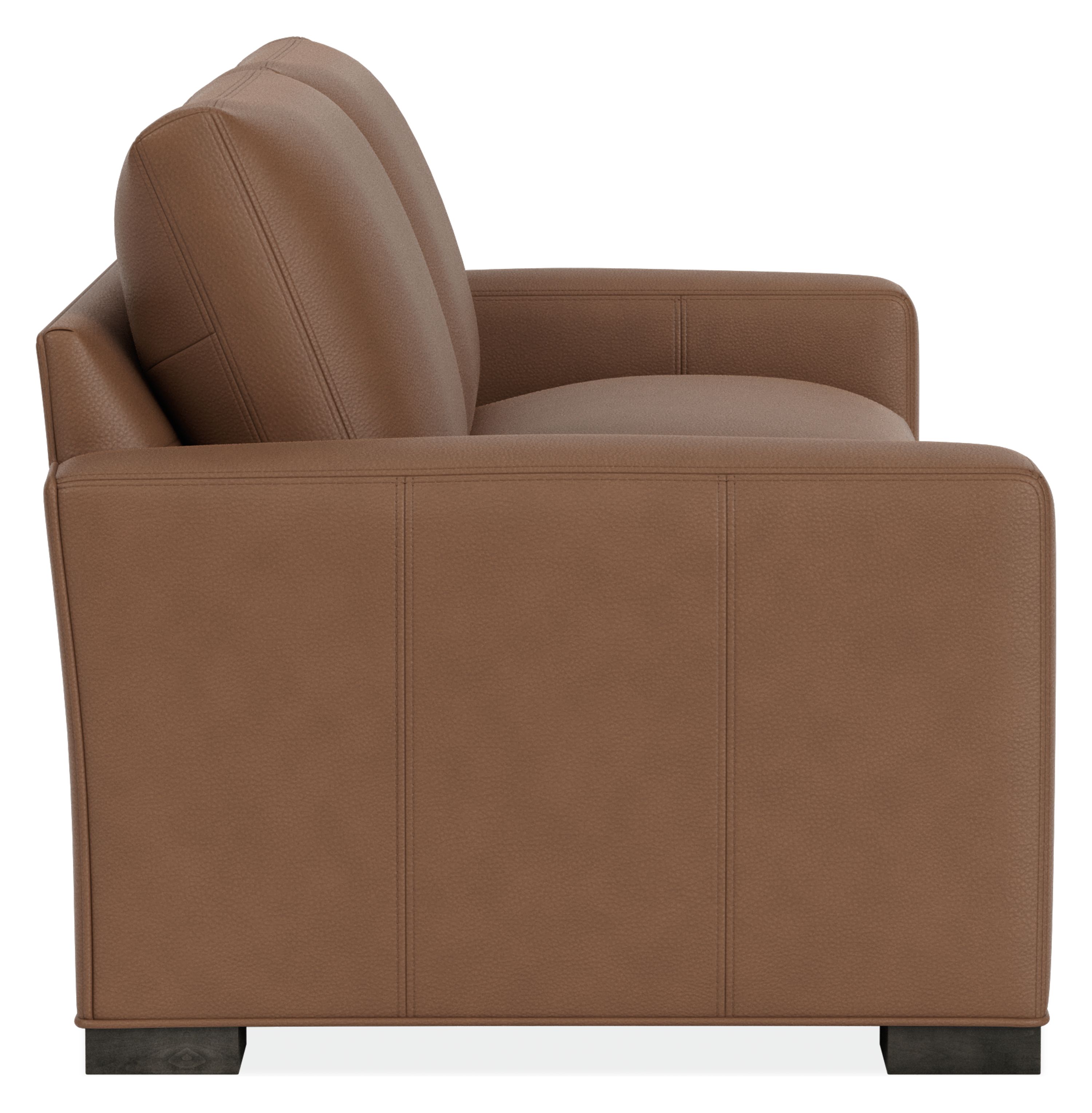 Side view of Metro 98-wide Two-Cushion Sofa in Laino Cognac Leather & Charcoal.