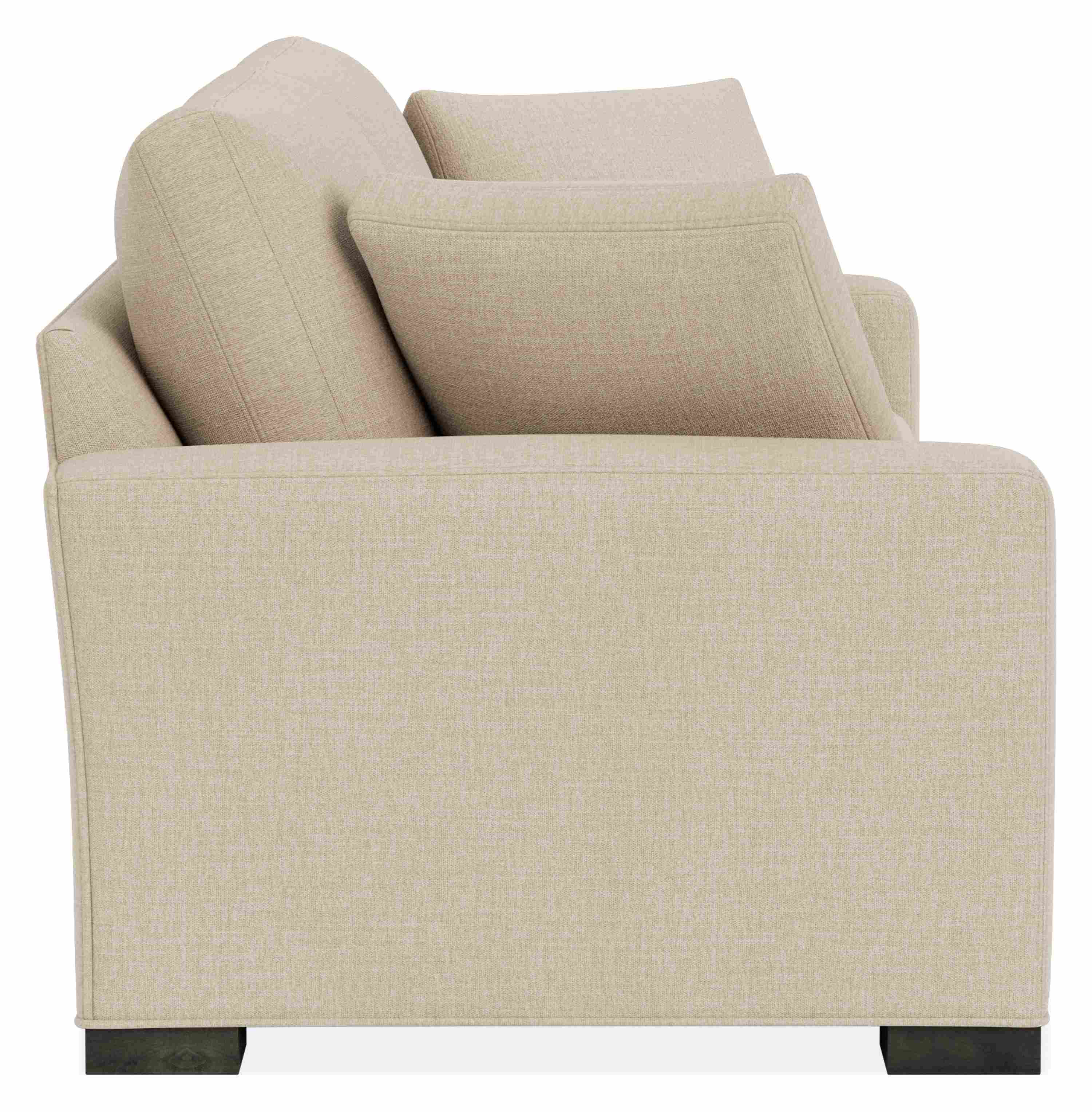 Side view of Metro 98-wide Two-Cushion Sofa in Mori Oatmeal Fabric & Charcoal.