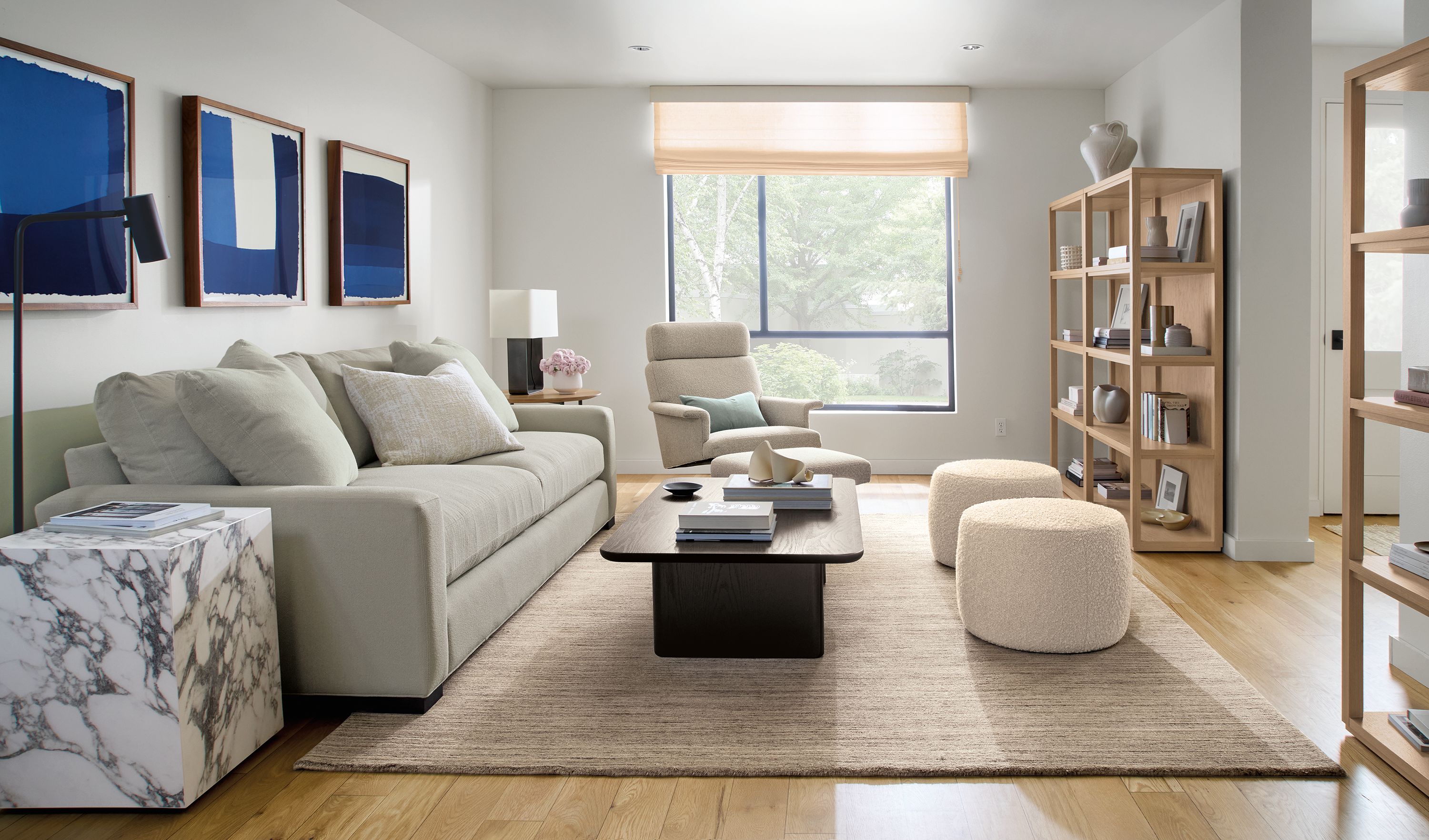 20" diam round ottoman in Dornick ivory fabric