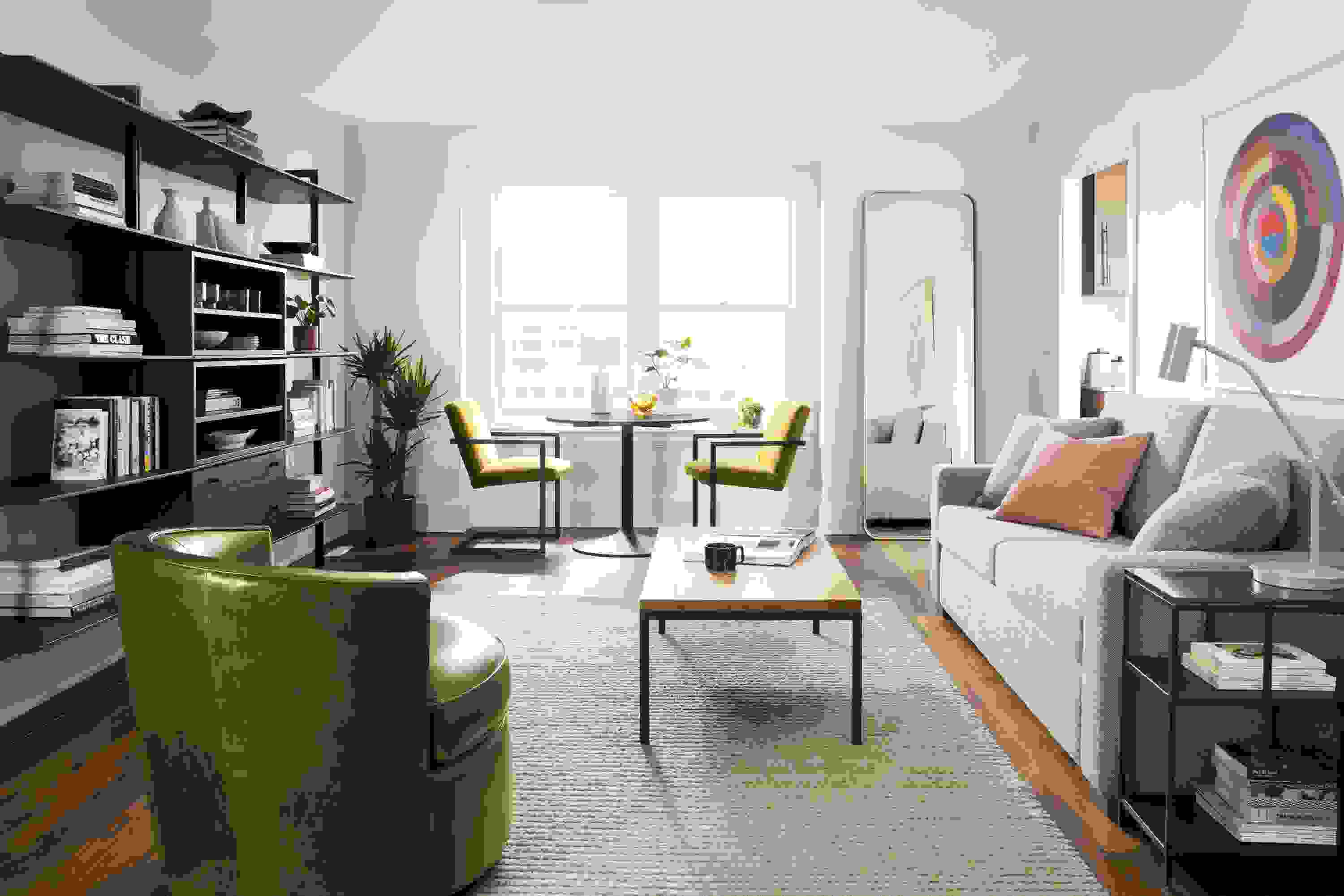 living room including metro sleeper sofa, otis swivel chair, parsons coffee table, arden rug.