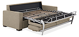 angled view of metro foldout sleeper sofa with support system fully extended without mattress.
