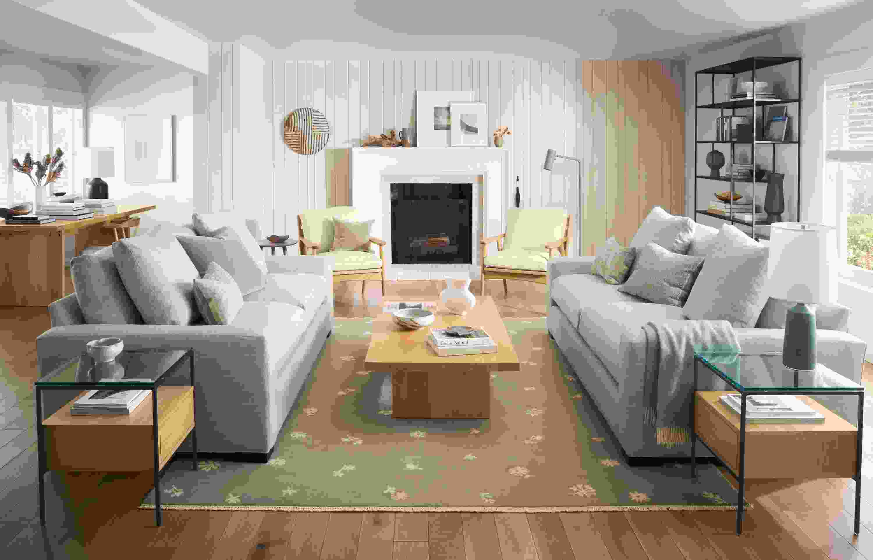 Great room with Ericson chairs in Urbino Ivory leather, metro sofas in Destin Linen, Tansy rug and  Corbett coffee table.