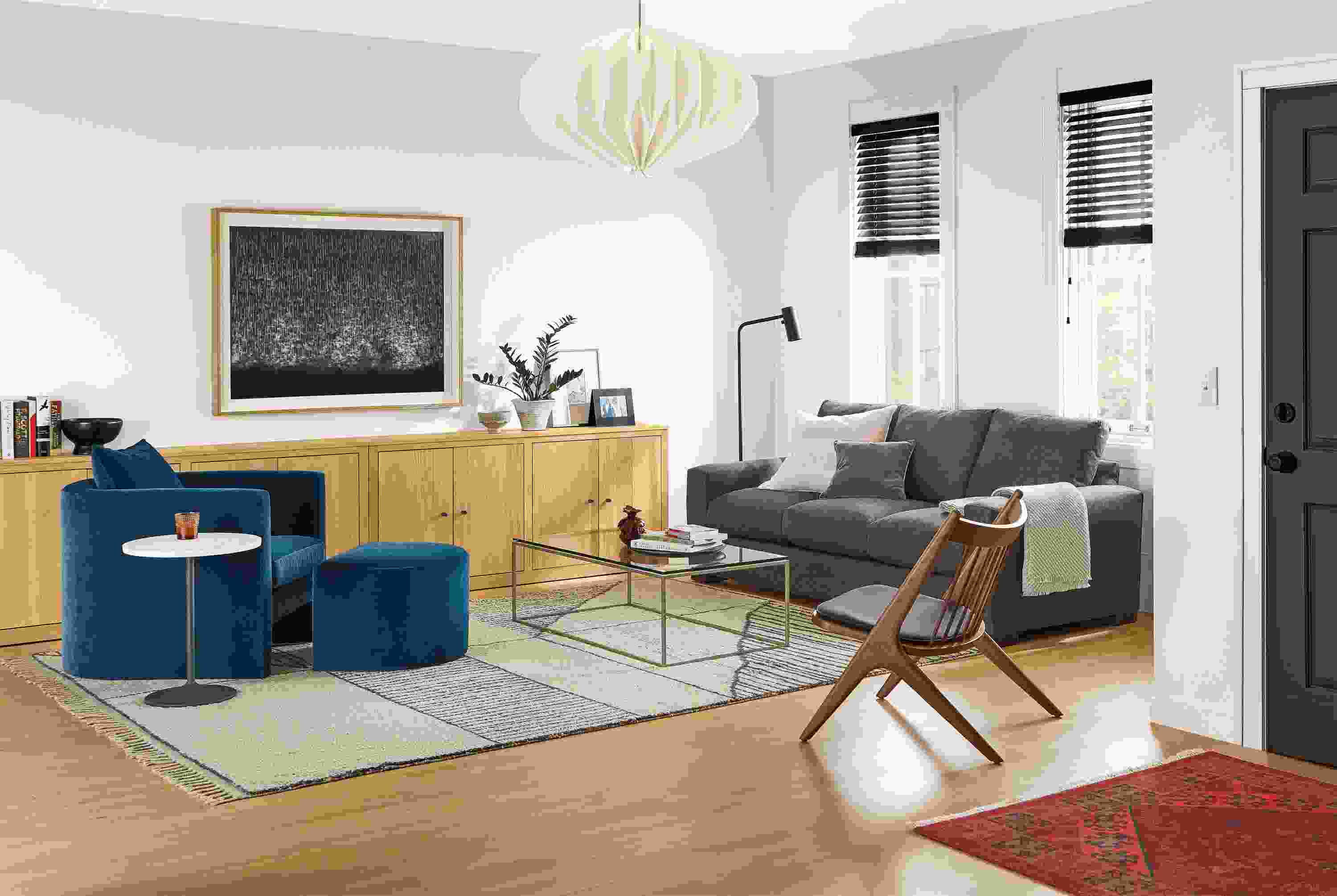 Detail of Silva chair in banks denim in living room with metro sofa.