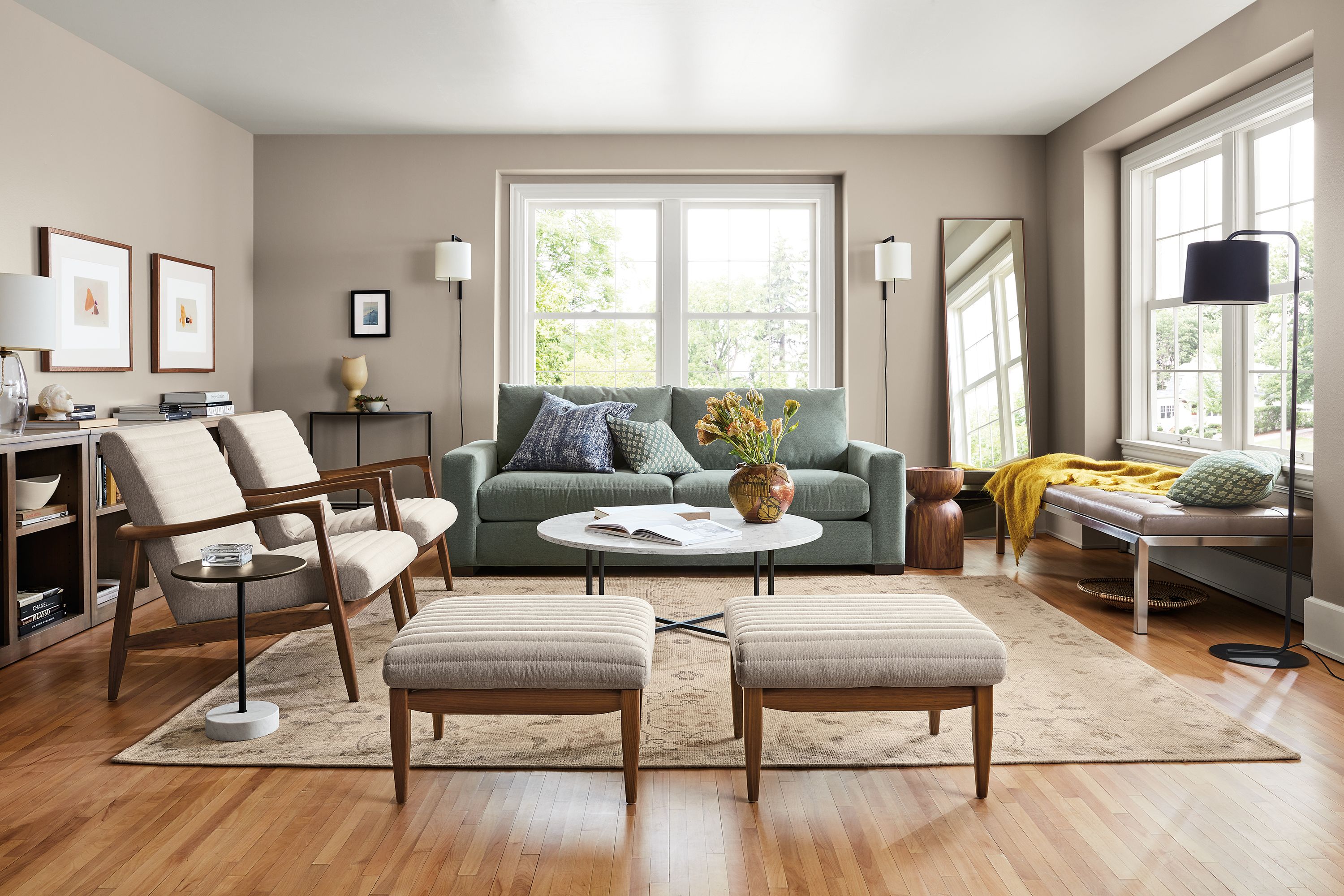 living room with metro sofa in light blue, two callan chairs, ravella daybed.